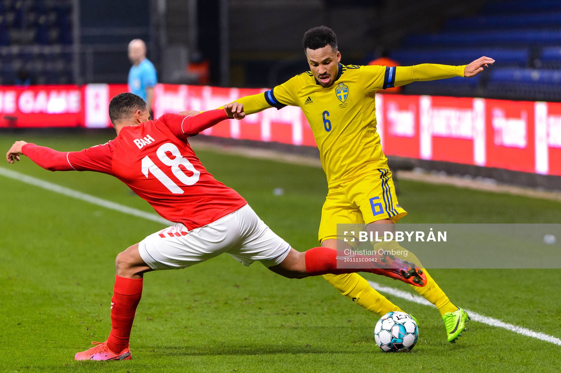 Alexander Bah of Denmark and Martin Olsson of Sweden
