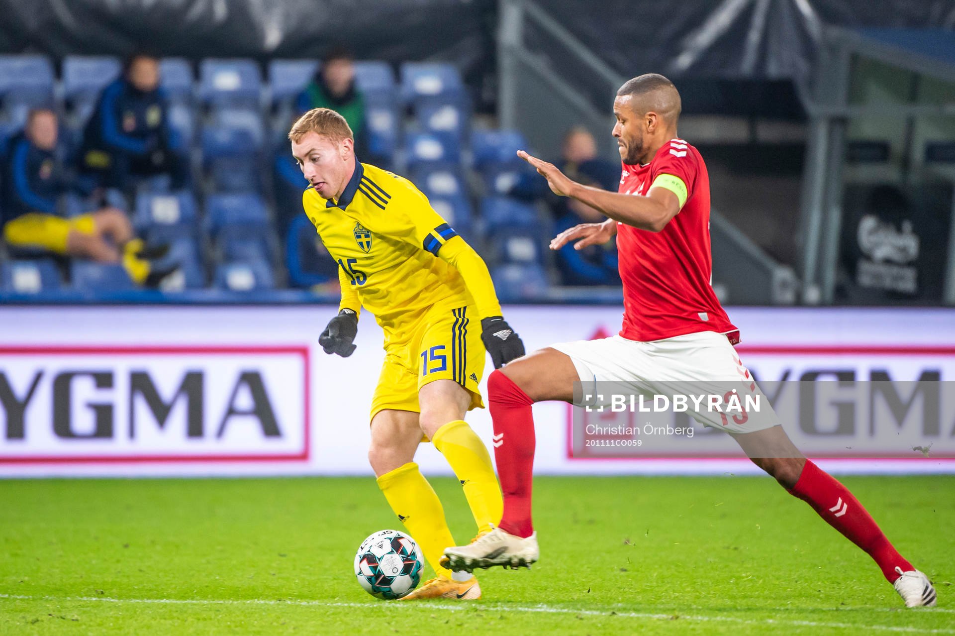 Dejan Kulusevski of Sweden and Mathias Jørgensen of Denmark