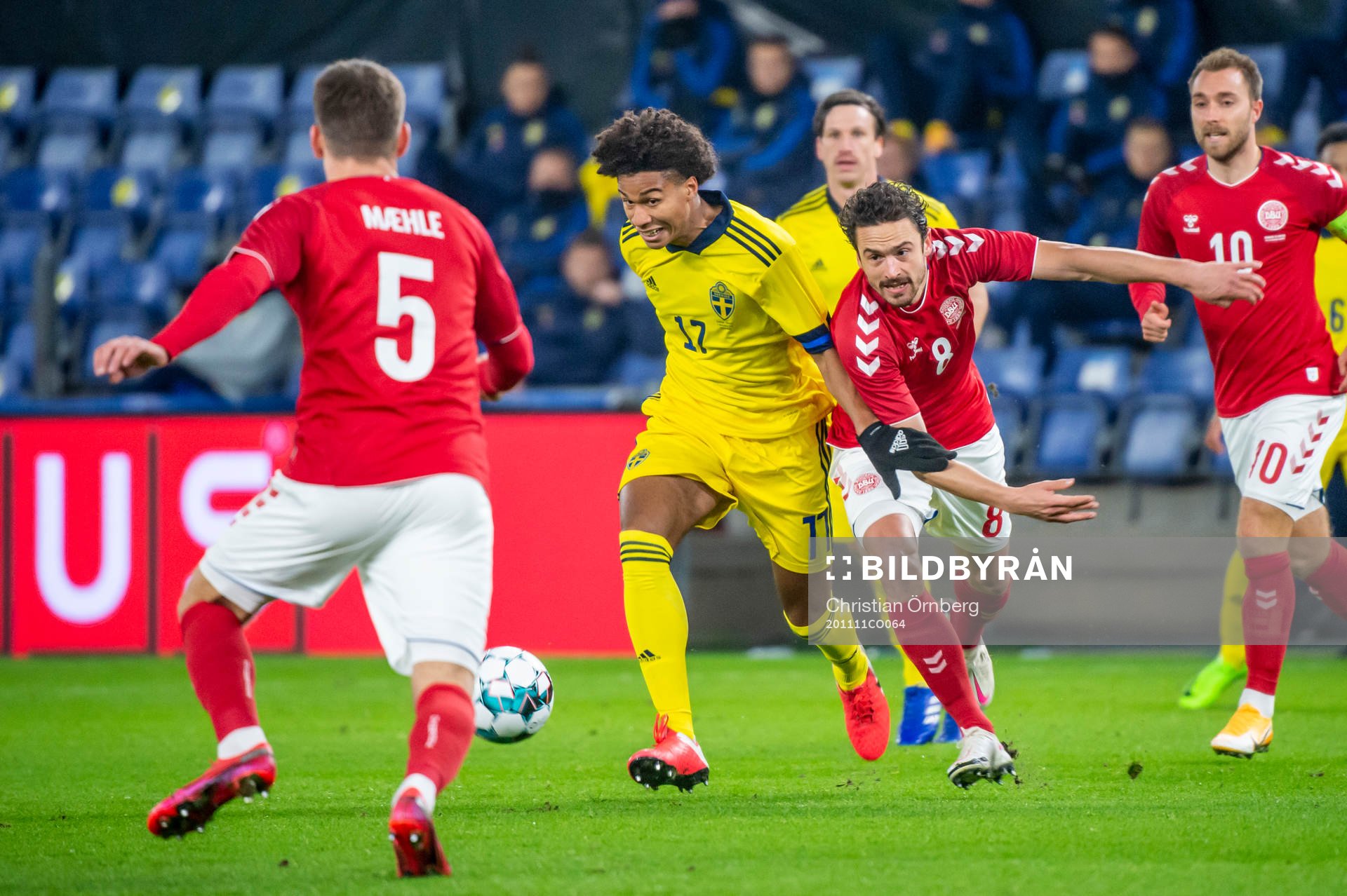 Jens-Lys Cajuste of Sweden and Thomas Delaney and Joakim