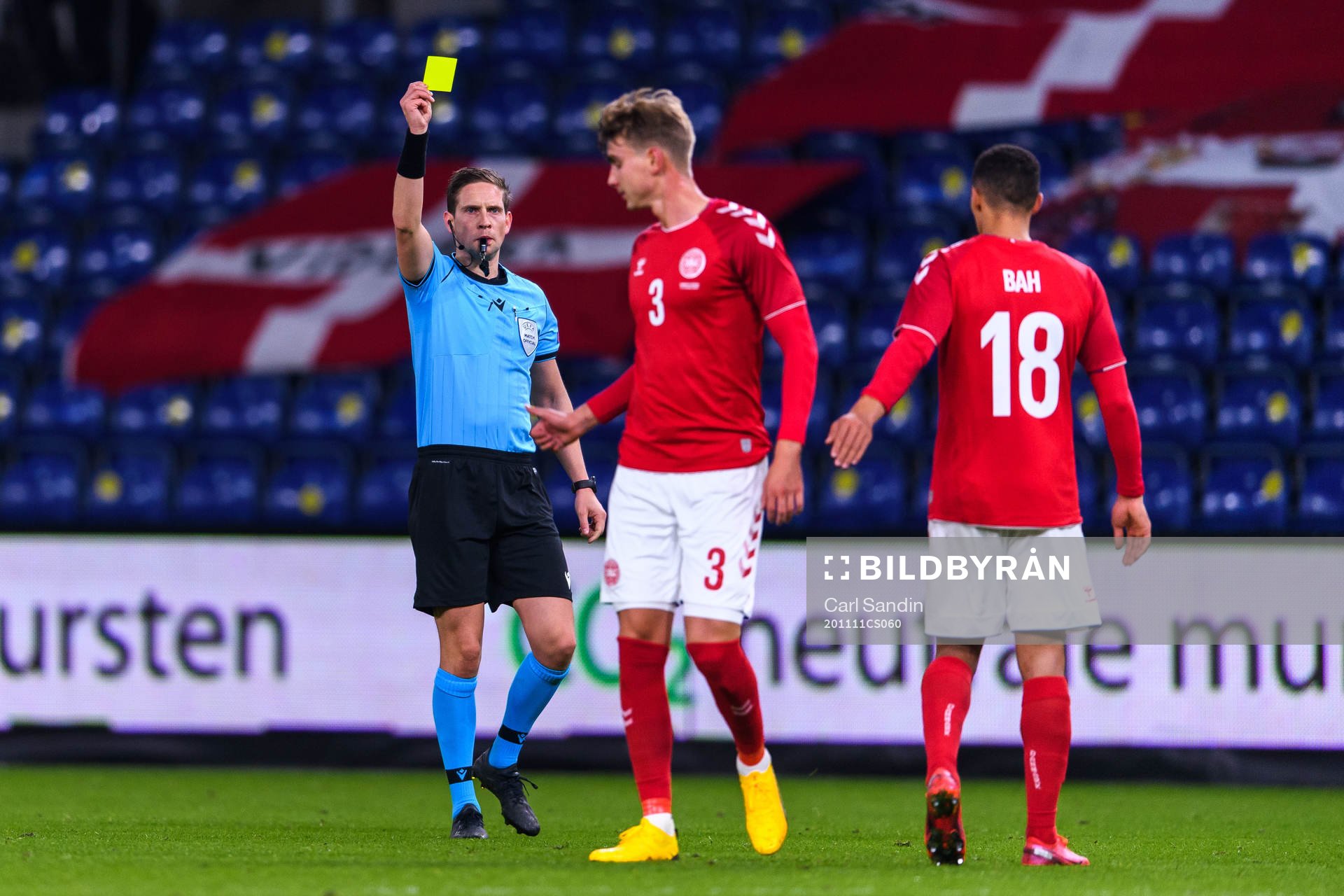 Andreas Maxsø of Denmark receives a warning from referee