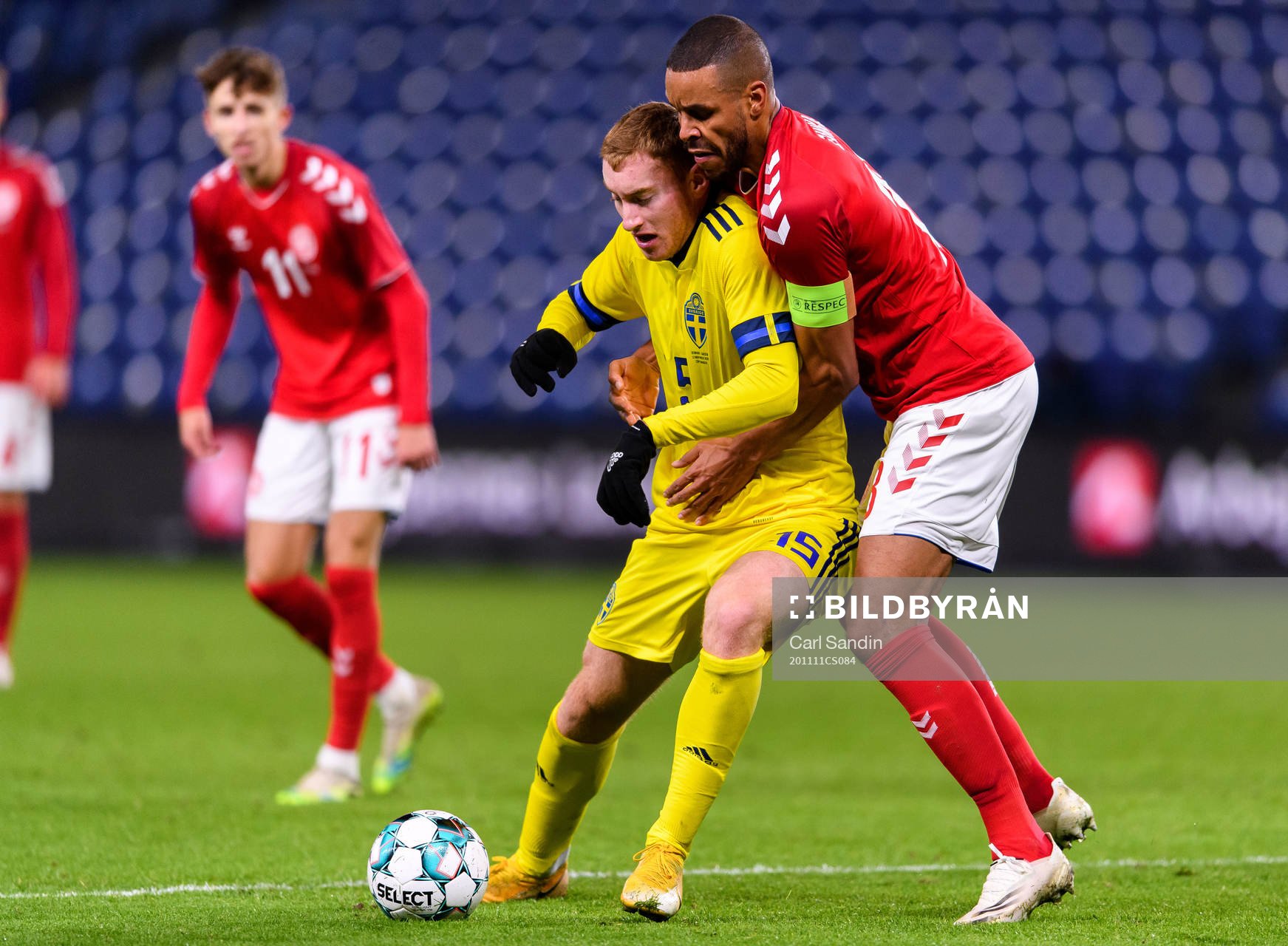 Dejan Kulusevski of Sweden and Mathias Jørgensen of Denmark