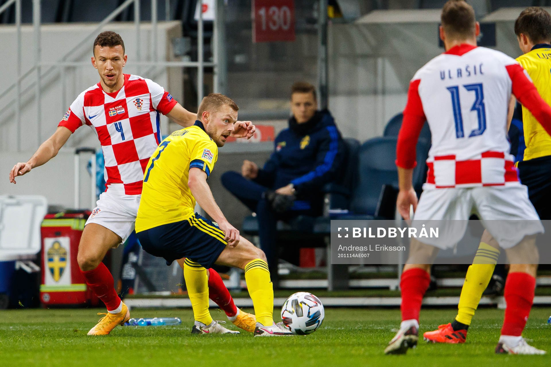 Ivan Perisic of Croatia and Sebastian Larsson of Sweden