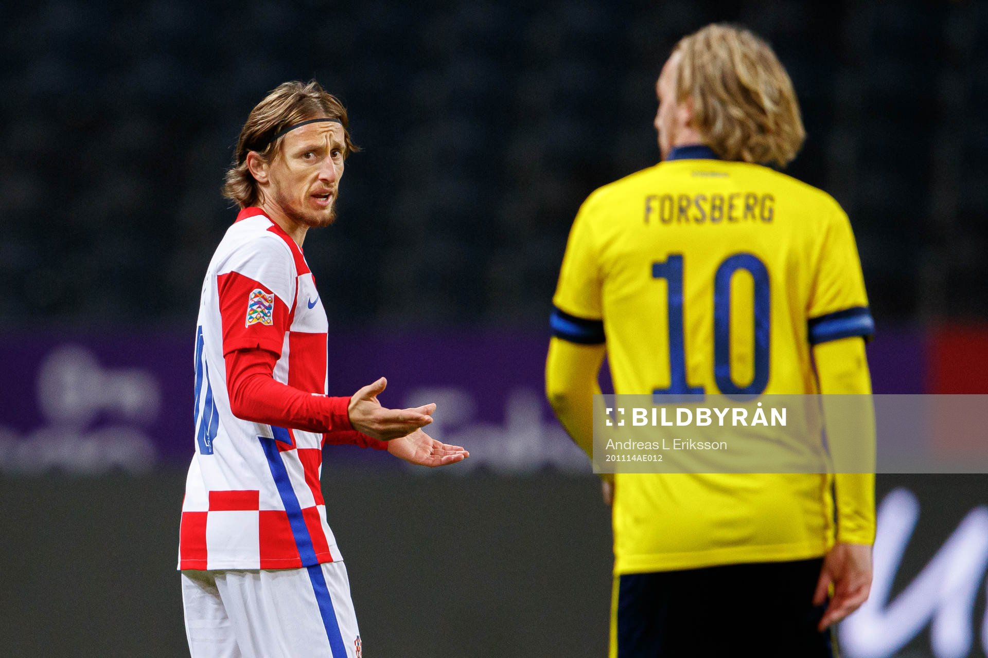 Luka Modric of Croatia and Emil Forsberg of Sweden