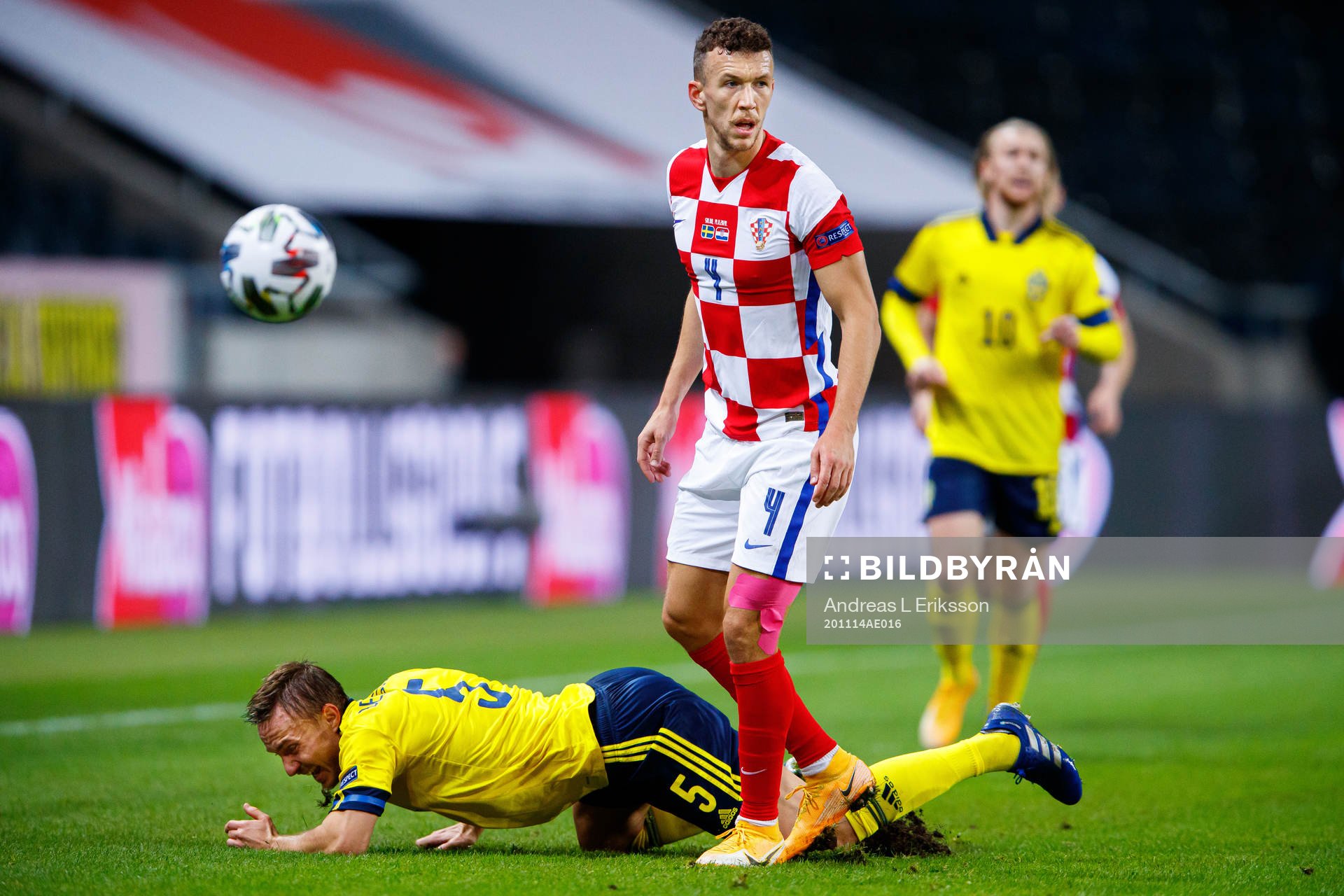 Pierre Bengtsson of Sweden and Ivan Perisic of Croatia