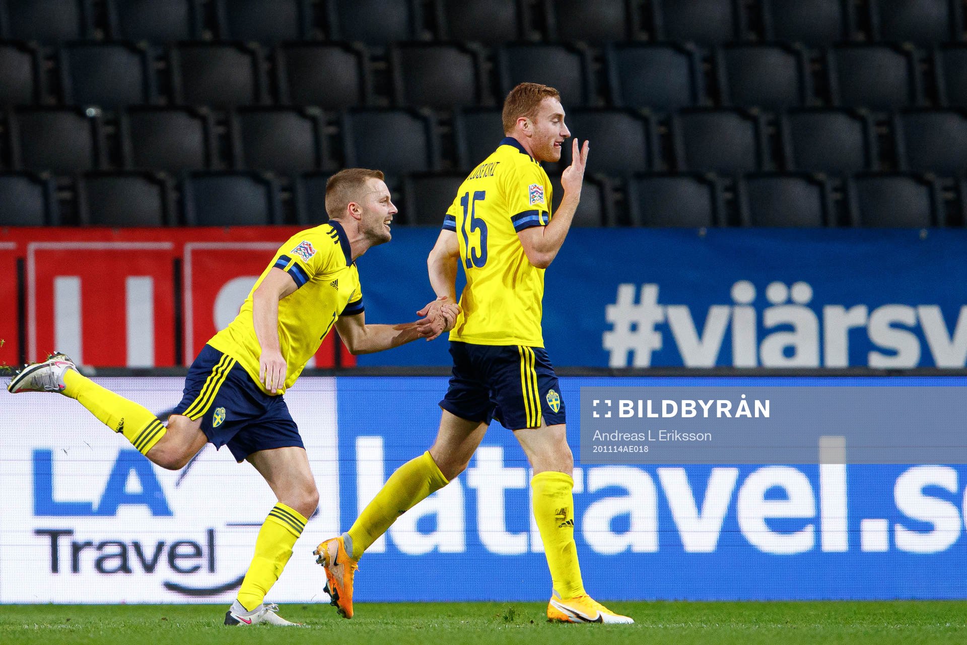 Sebastian Larsson and Dejan Kulusevski of Sweden celebrate