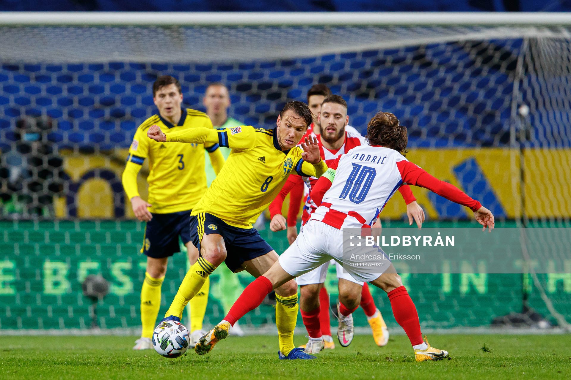 Albin Ekdal of Sweden and Luka Modric of Croatia