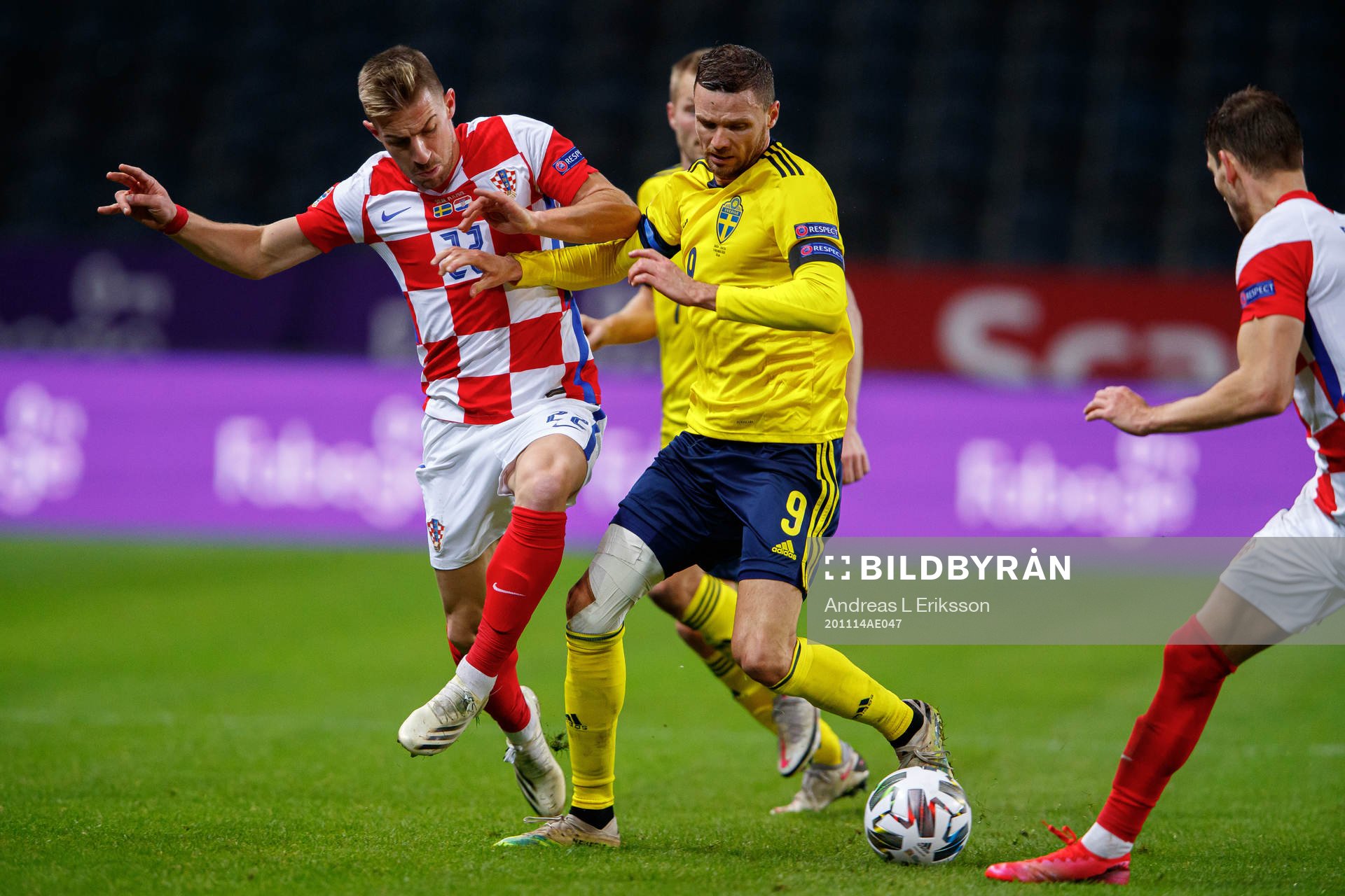Dario Melnjak of Croatia and Marcus Berg of Sweden