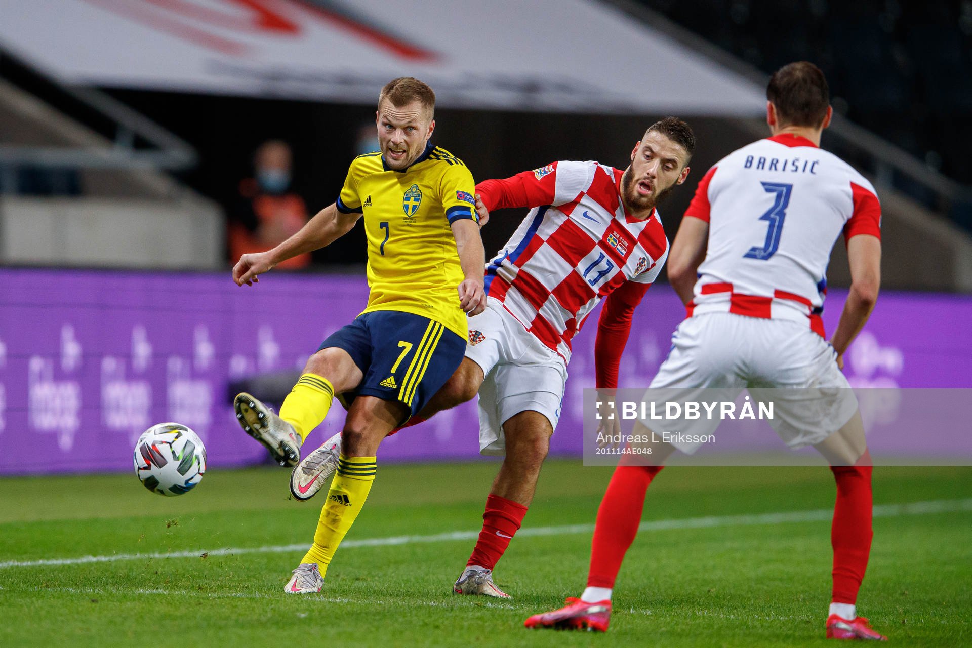Sebastian Larsson of Sweden and Nikola Vlasic of Croatia