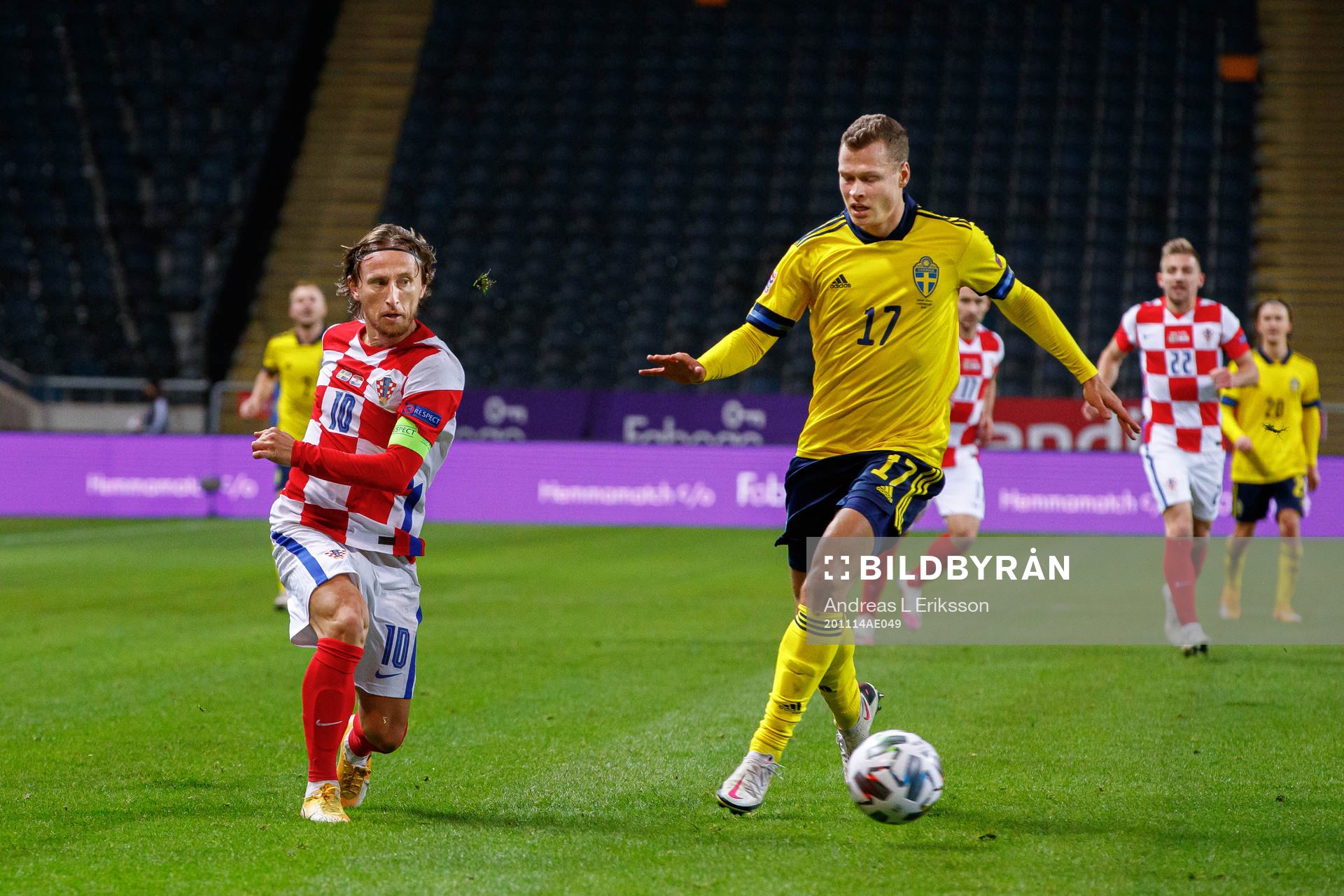 Luka Modric of Croatia and Viktor Claesson of Sweden