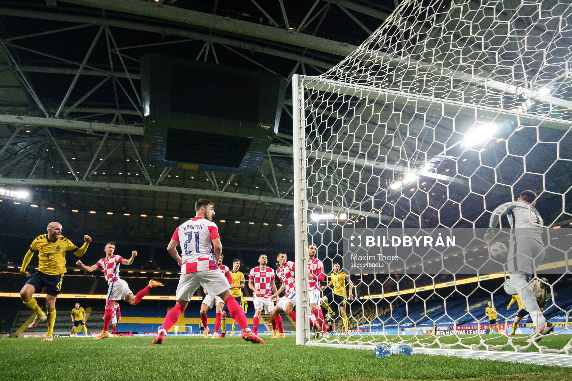 Marcus Danielson of Sweden scores the 2-0 goal behind