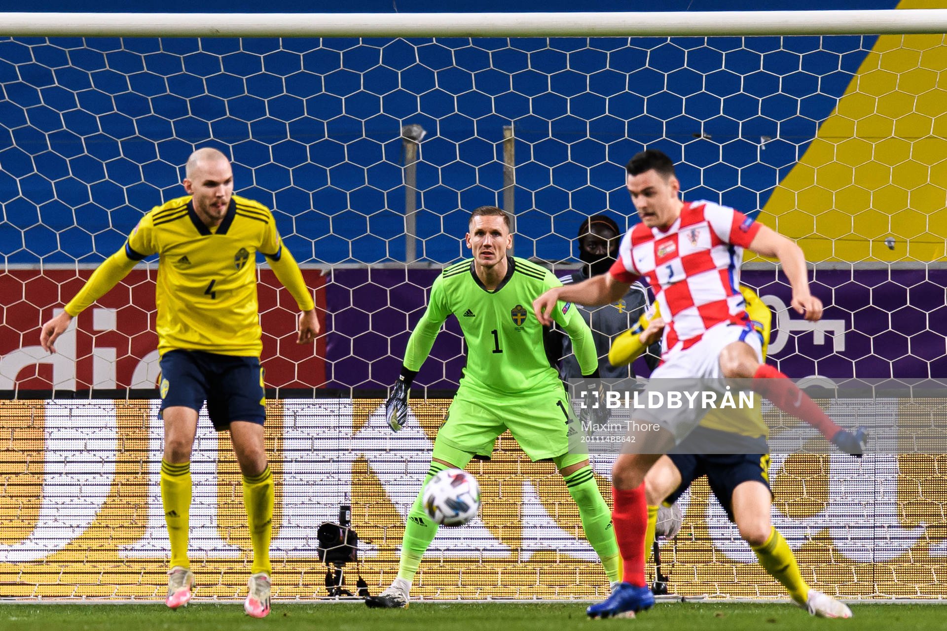 Marcus Danielson and goalkeeper Robin Olsen of Sweden