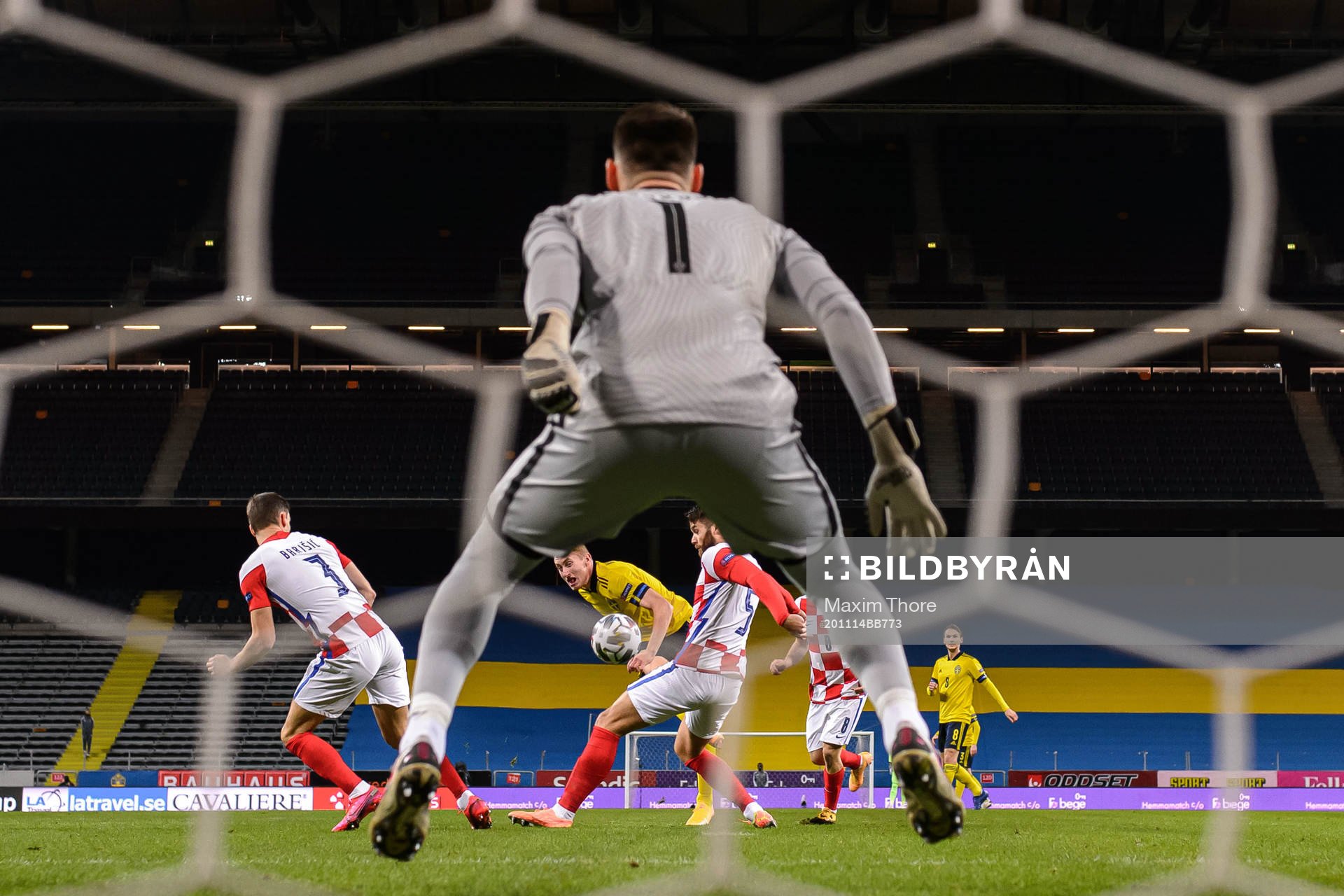 Dejan Kulusevski of Sweden against Duje Caleta-Car and