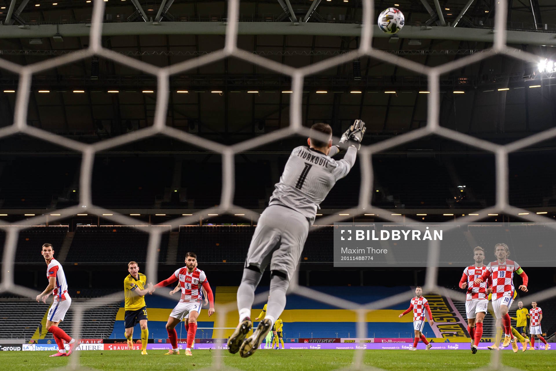 Dejan Kulusevski of Sweden against Duje Caleta-Car and