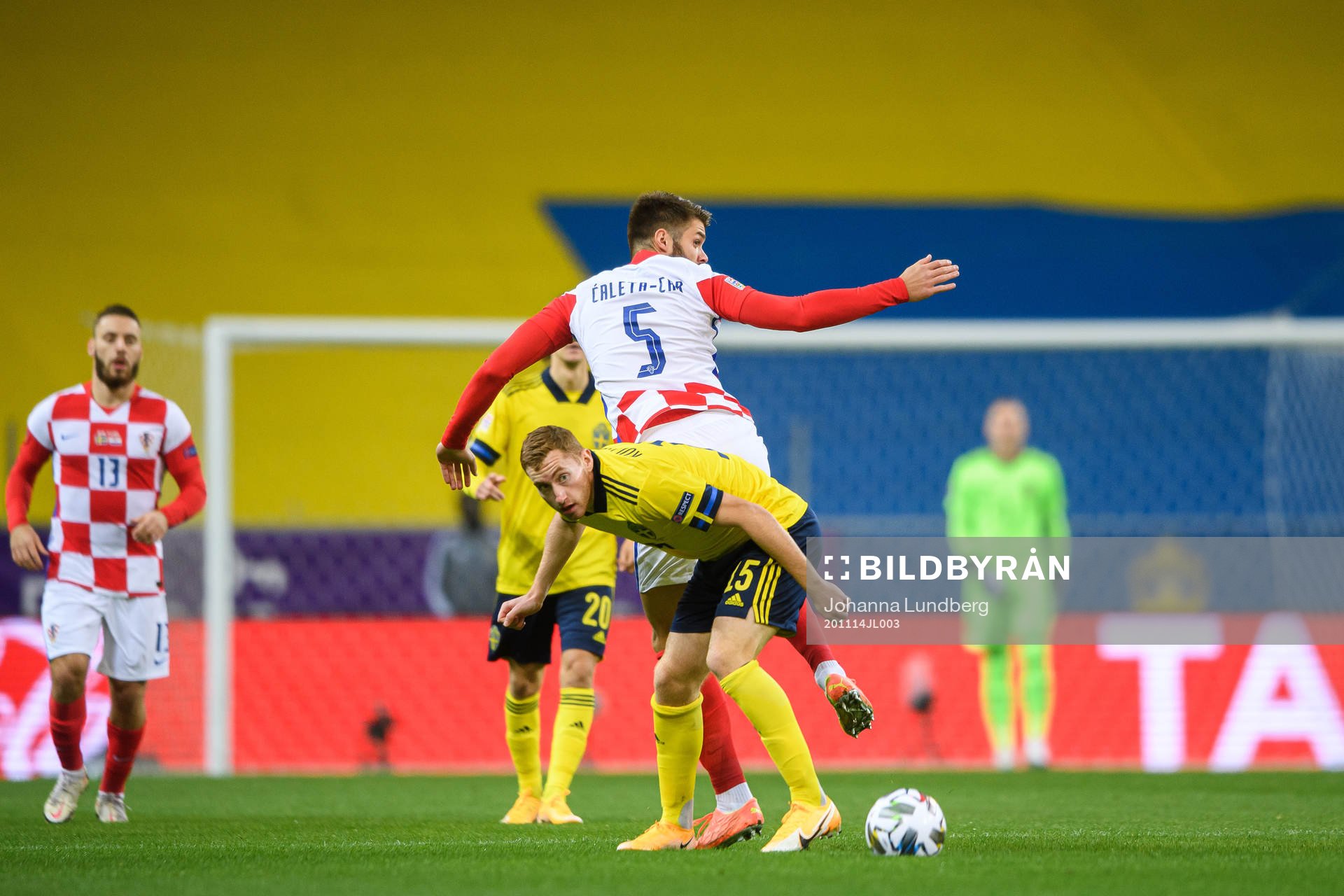 Dejan Kulusevski of Sweden and Duje Caleta-Car of Croatia