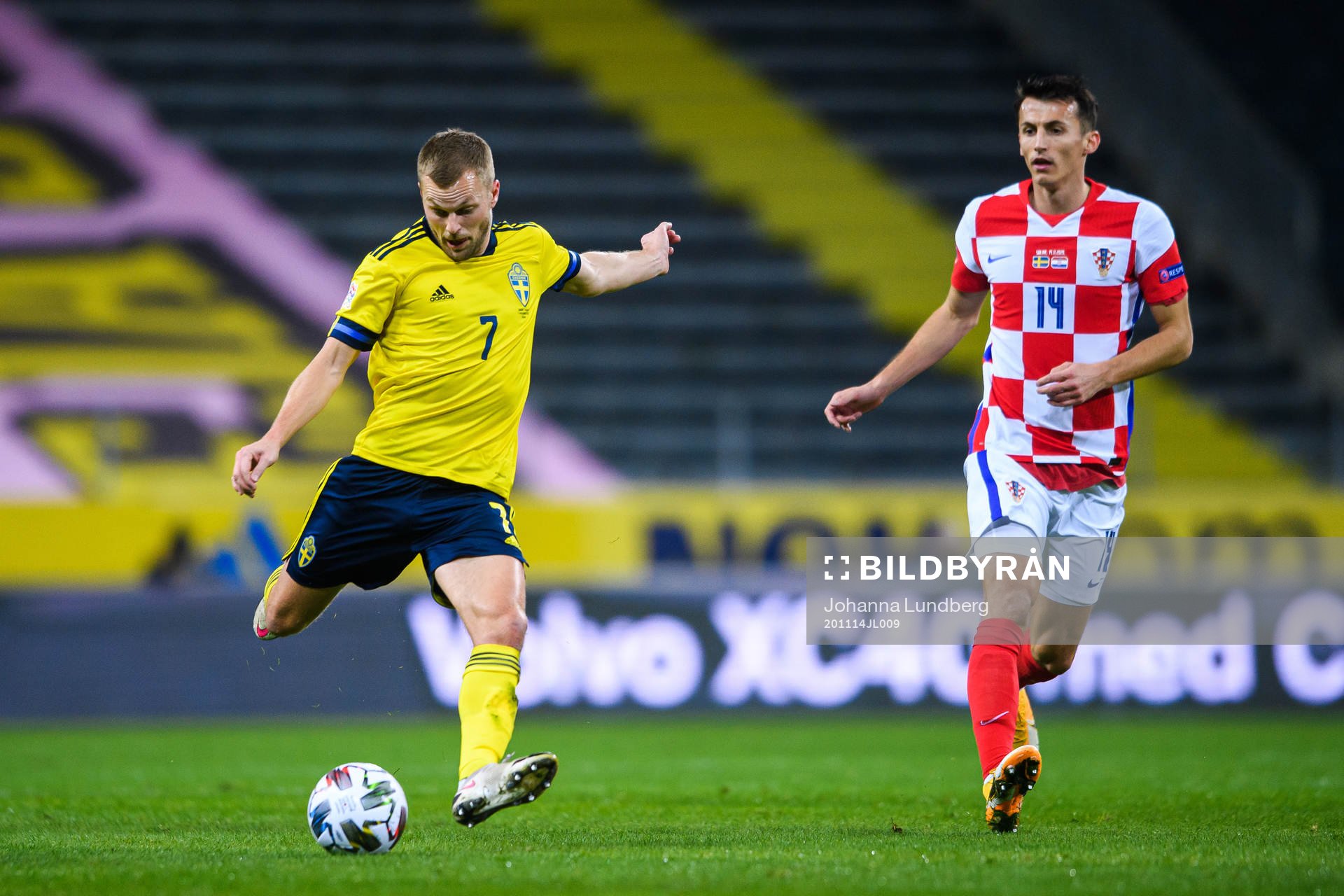Sebastian Larsson of Sweden and Ante Budimir of Croatia