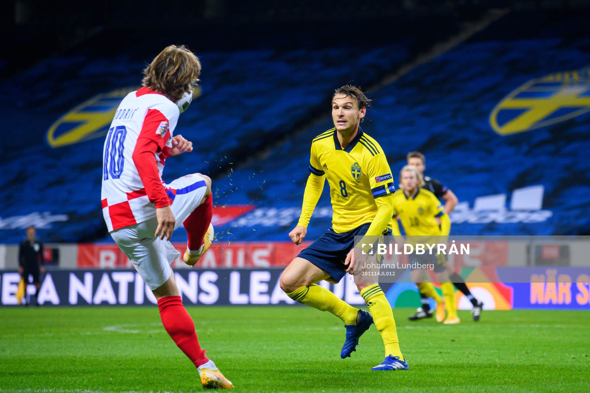 Luka Modric of Croatia and Albin Ekdal of Sweden