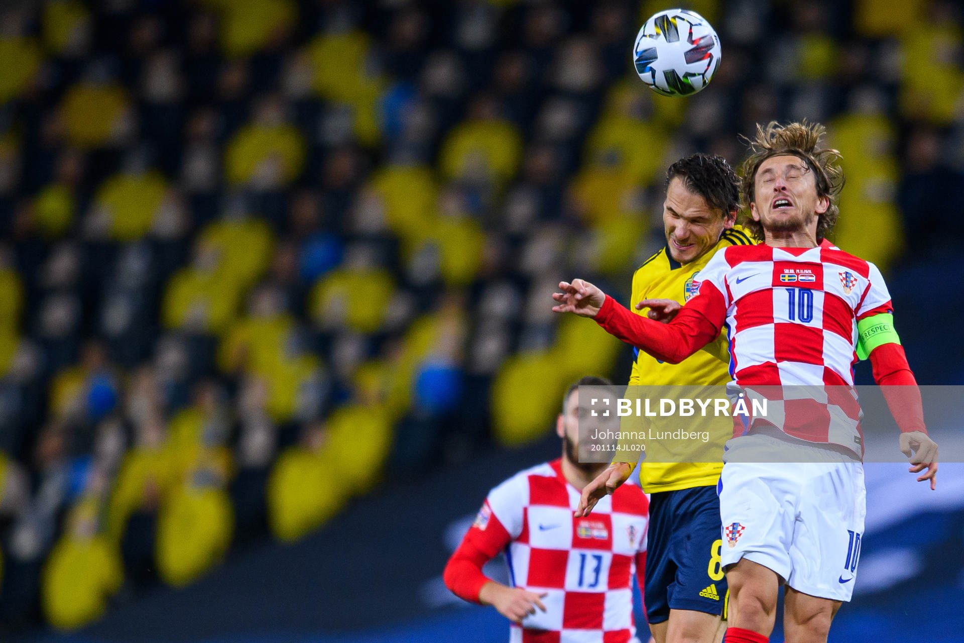 Albin Ekdal of Sweden and Luka Modric of Croatia