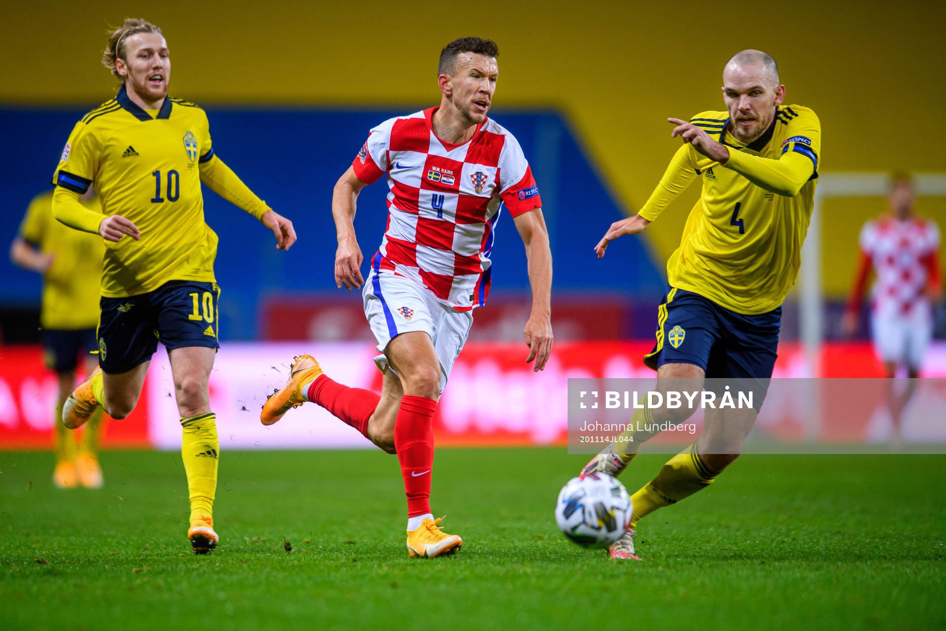 Ivan Perisic of Croatia against Emil Forsberg and Marcus