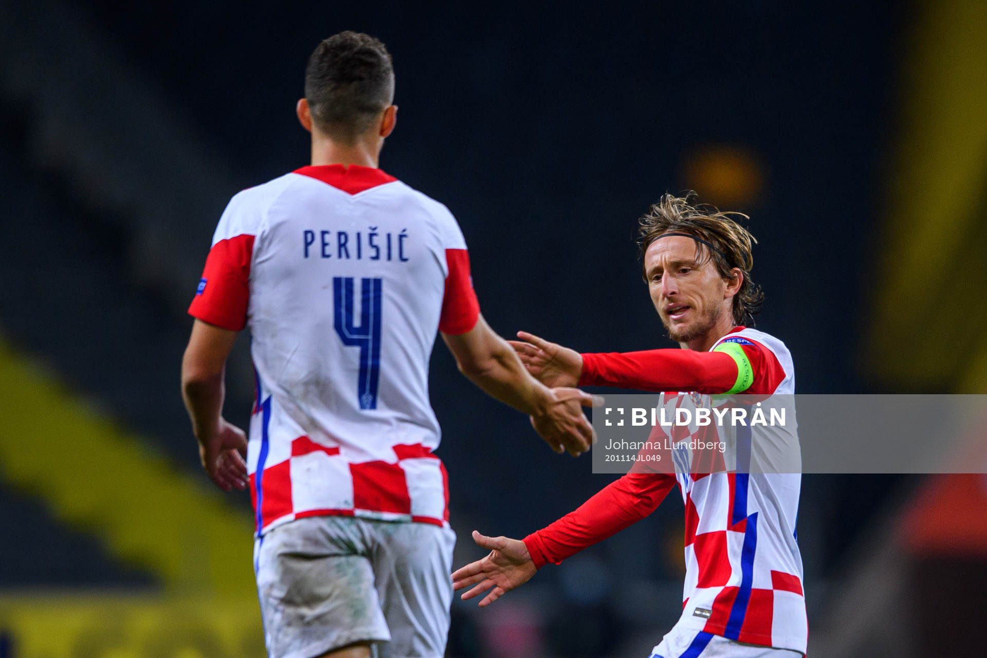 Ivan Perisic and Luka Modric of Croatia celebrate the 2-1