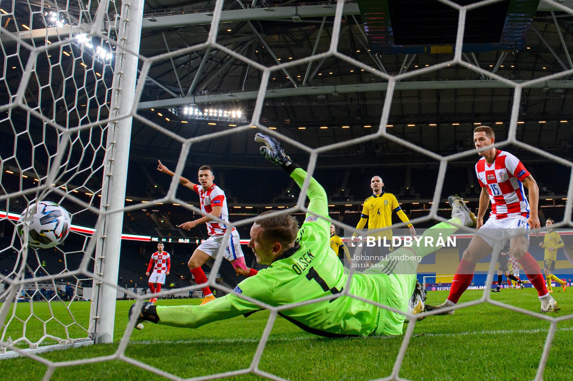 Ivan Perisic of Croatia scores the 2-1 goal behind
