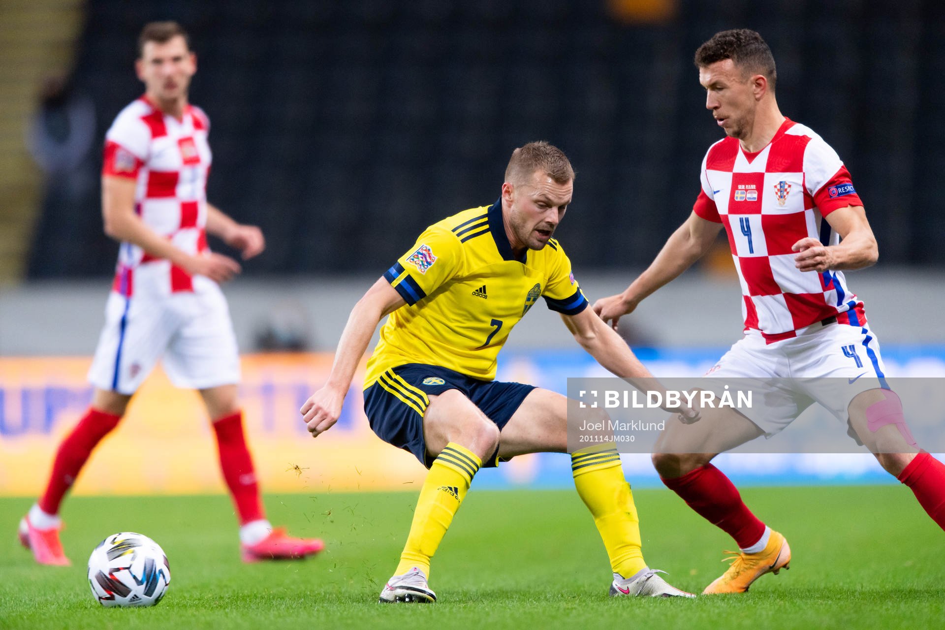 Sebastian Larsson of Sweden and Ivan Perisic of Croatia