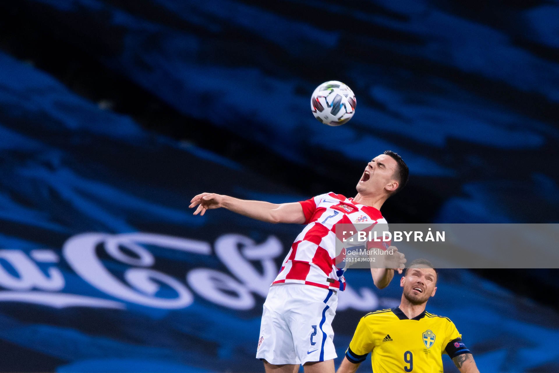 Filip Uremovic of Croatia and Marcus Berg of Sweden