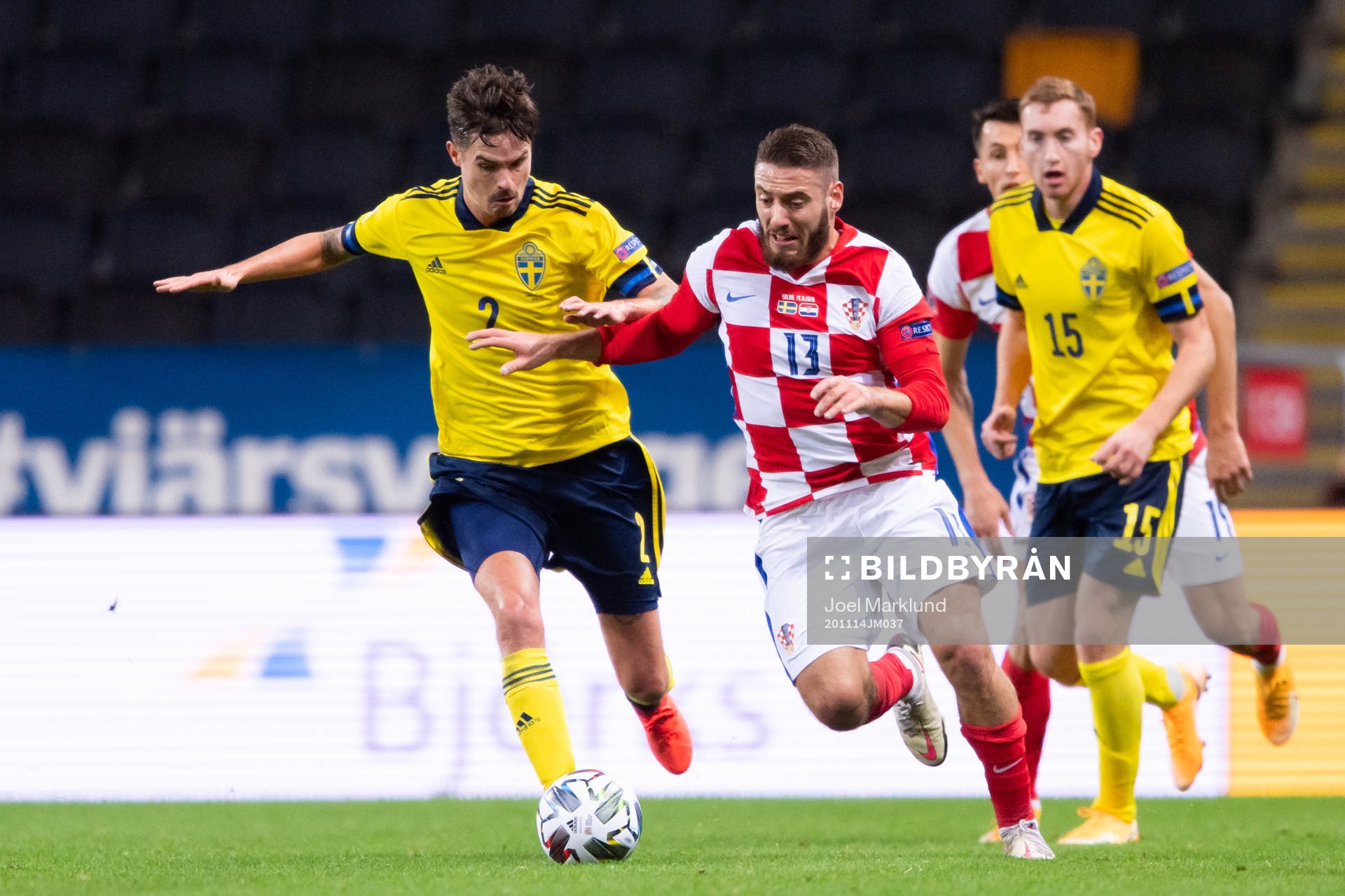 Mikael Lustig of Sweden and Nikola Vlasic of Croatia