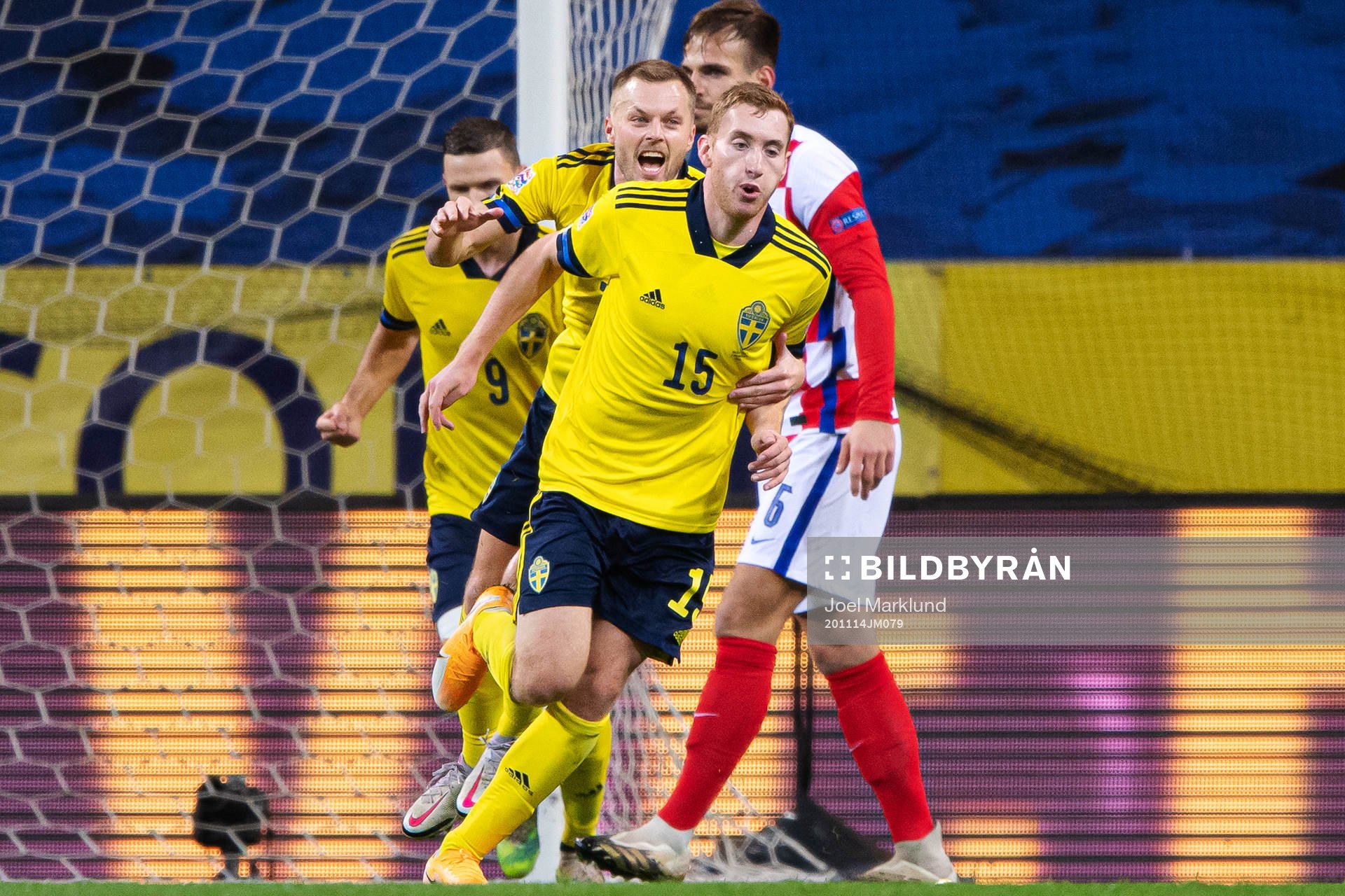 Sebastian Larsson and Dejan Kulusevski of Sweden celebrate