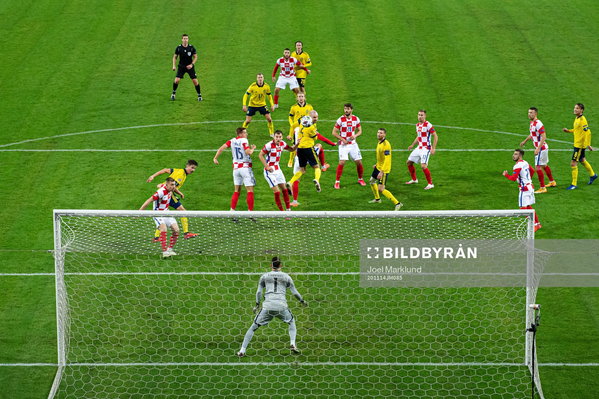 Marcus Danielson of Sweden with a header