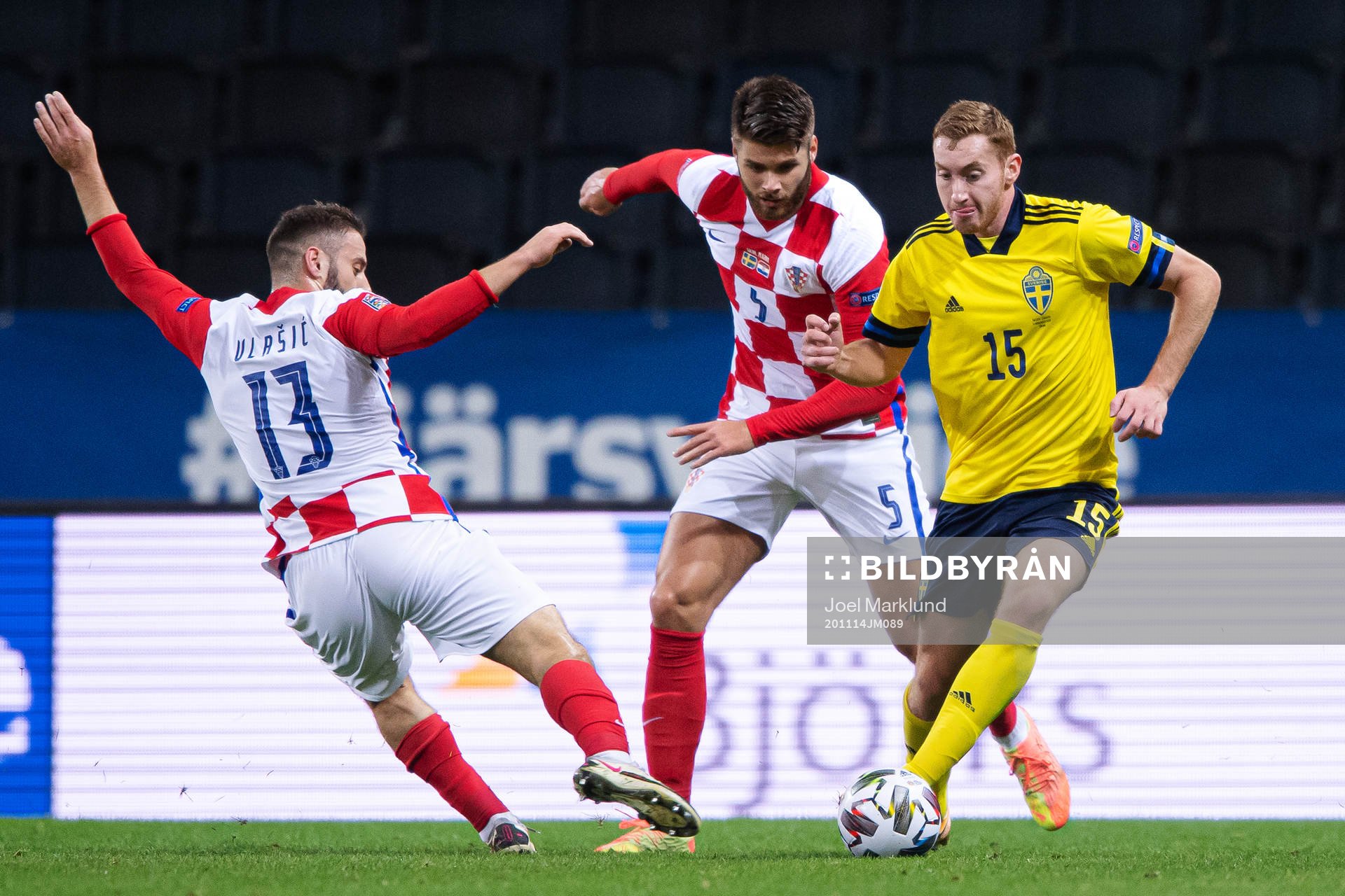 Nikola Vlasic and Duje Caleta-Car of Croatia in action