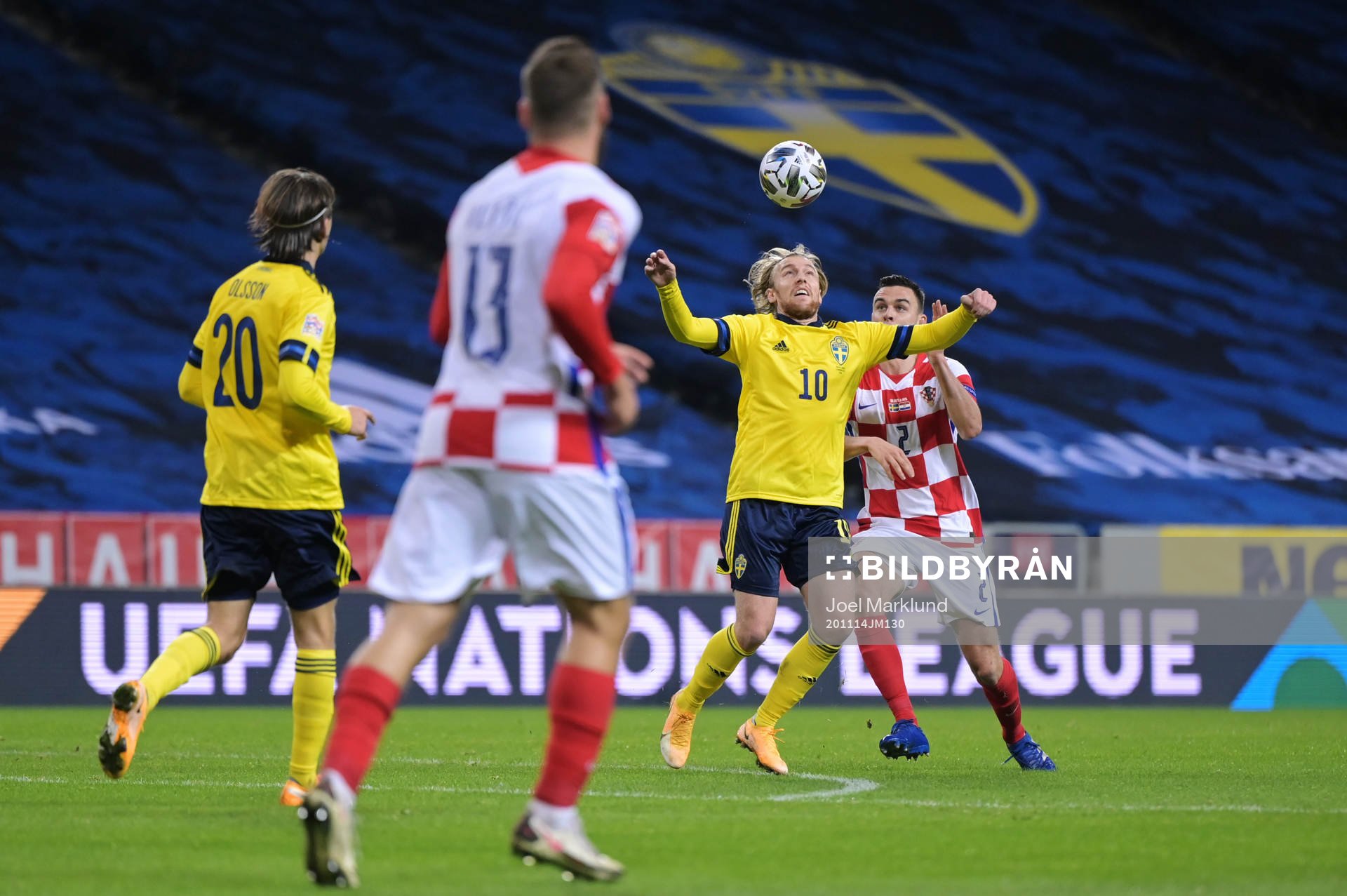 Emil Forsberg of Sweden and Filip Uremovic of Croatia