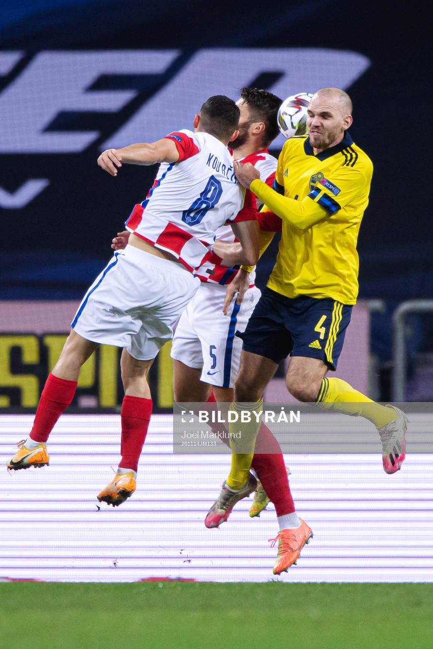 Mateo Kovacic and Duje Caleta-Car of Croatia in action