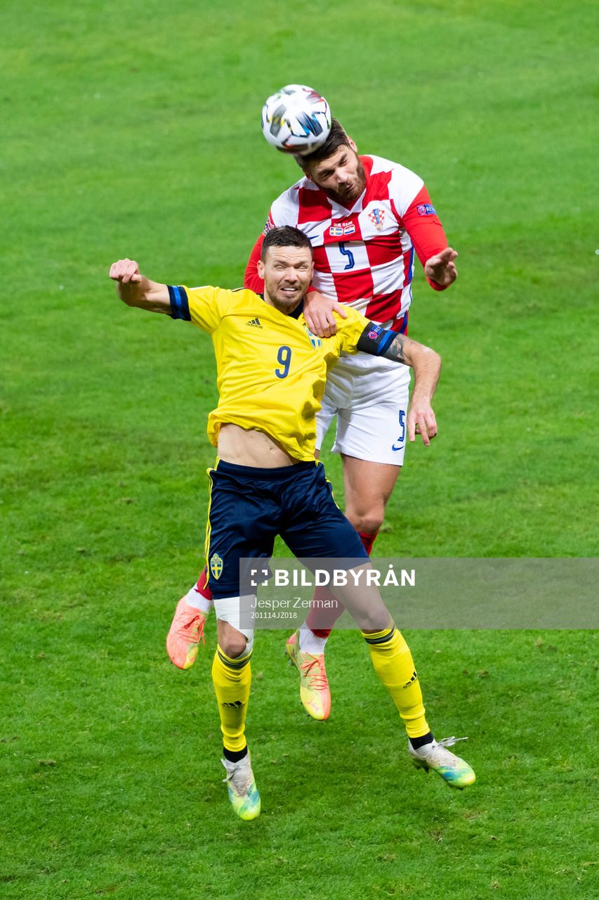 Marcus Berg of Sweden and Duje Caleta-Car of Croatia