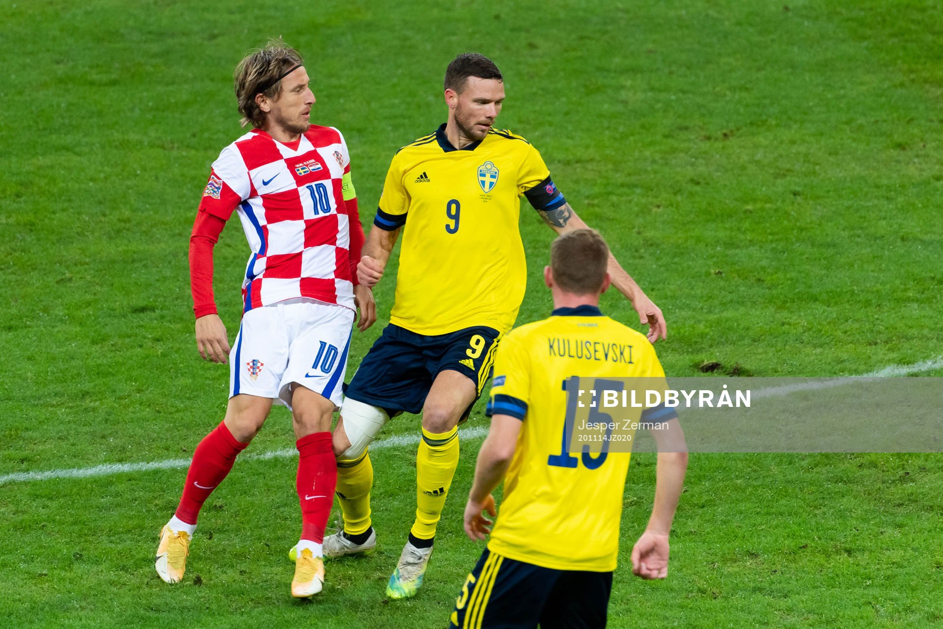 Luka Modric of Croatia and Marcus Berg of Sweden