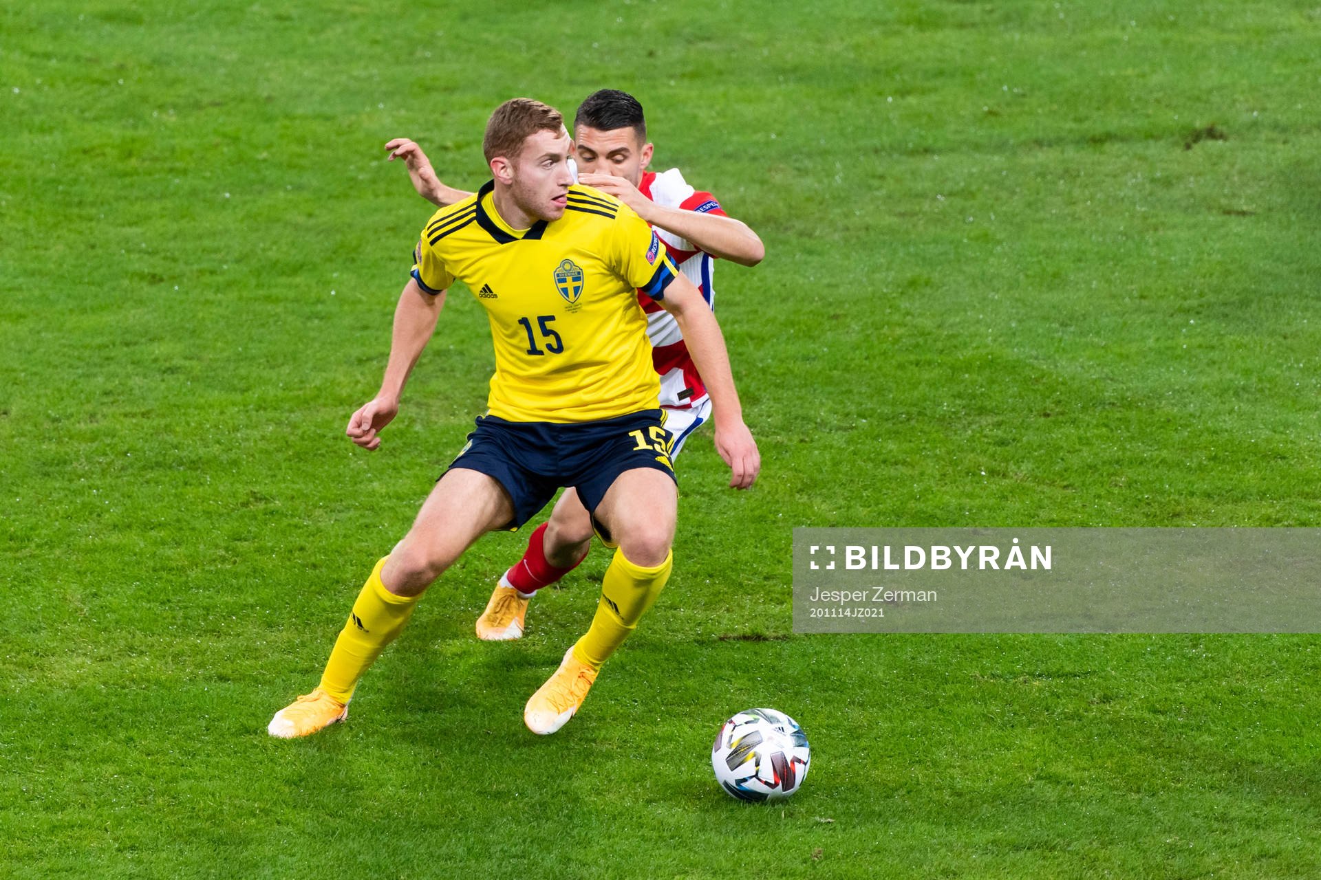 Dejan Kulusevski of Sweden and Ivan Perisic of Croatia