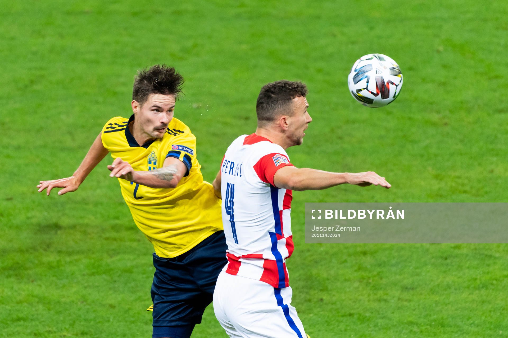 Mikael Lustig of Sweden and Ivan Perisic of Croatia