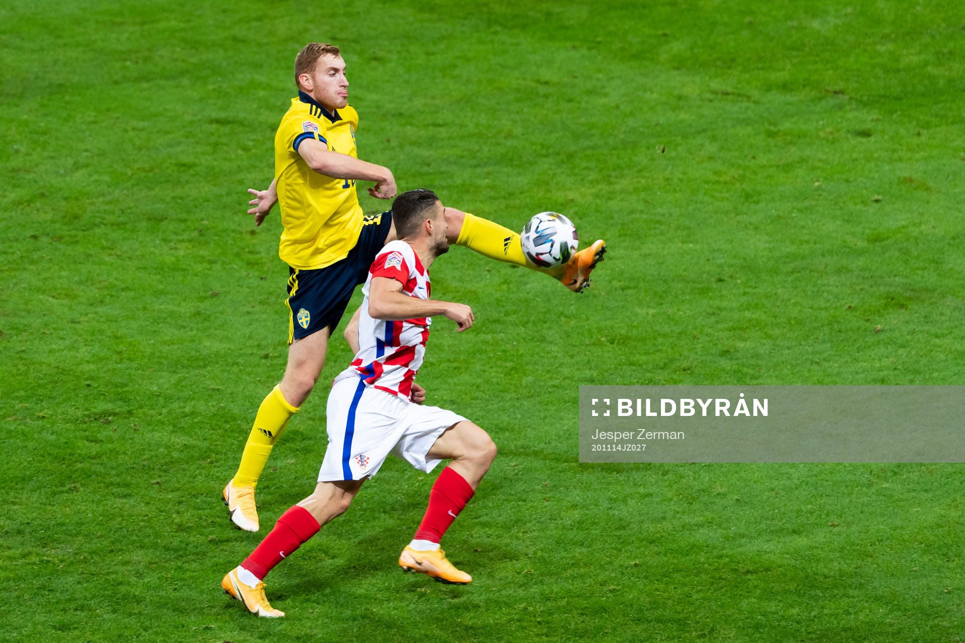 Dejan Kulusevski of Sweden and Mateo Kovacic of Croatia
