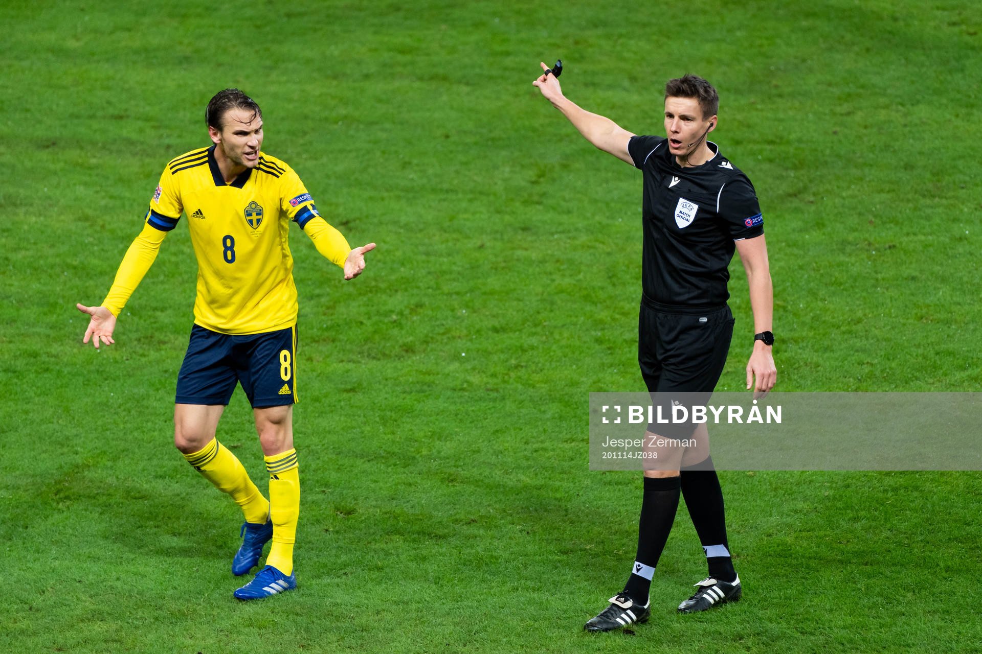 Albin Ekdal of Sweden reacts to referee Daniel Siebert