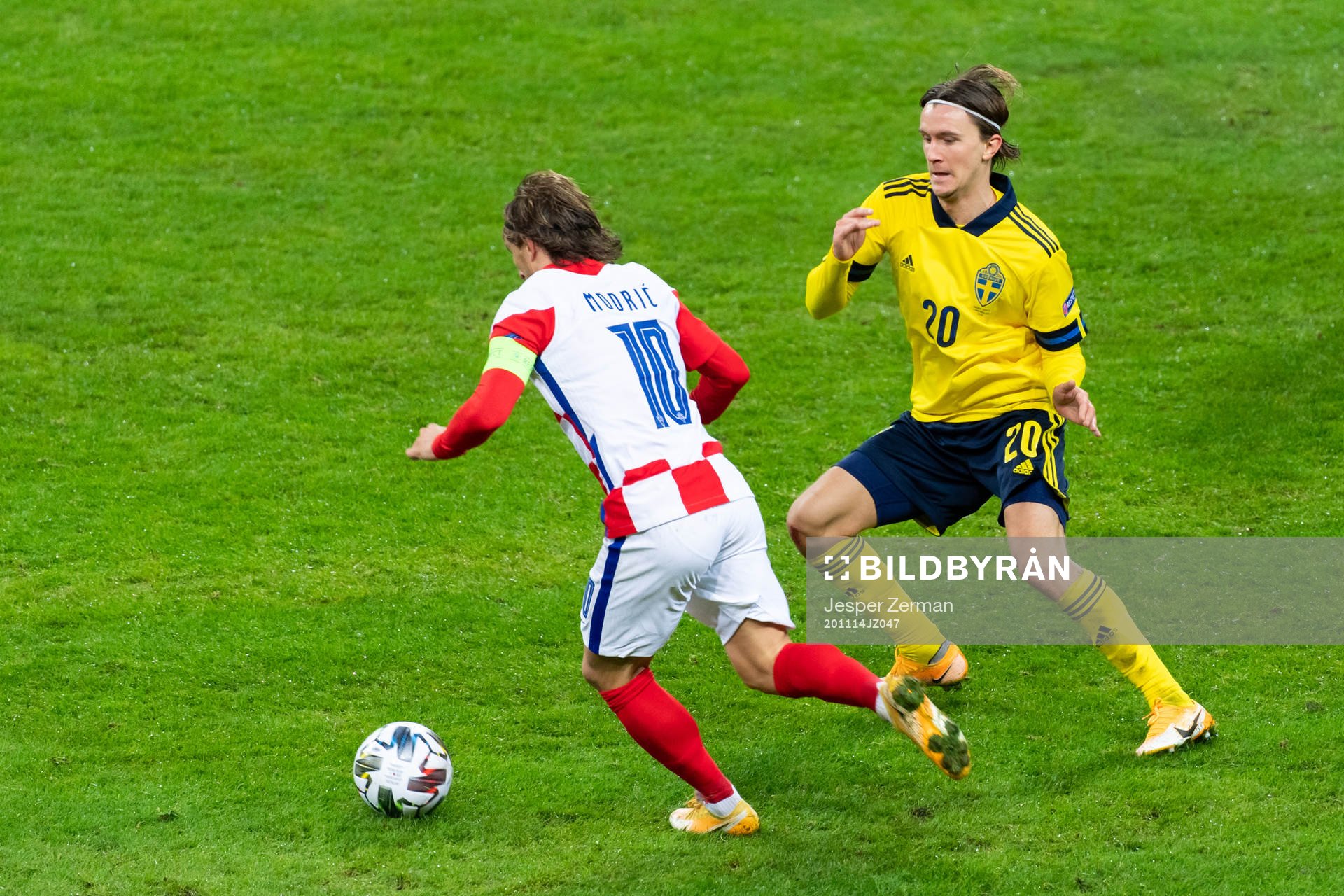 Luka Modric of Croatia and Kristoffer Olsson of Sweden