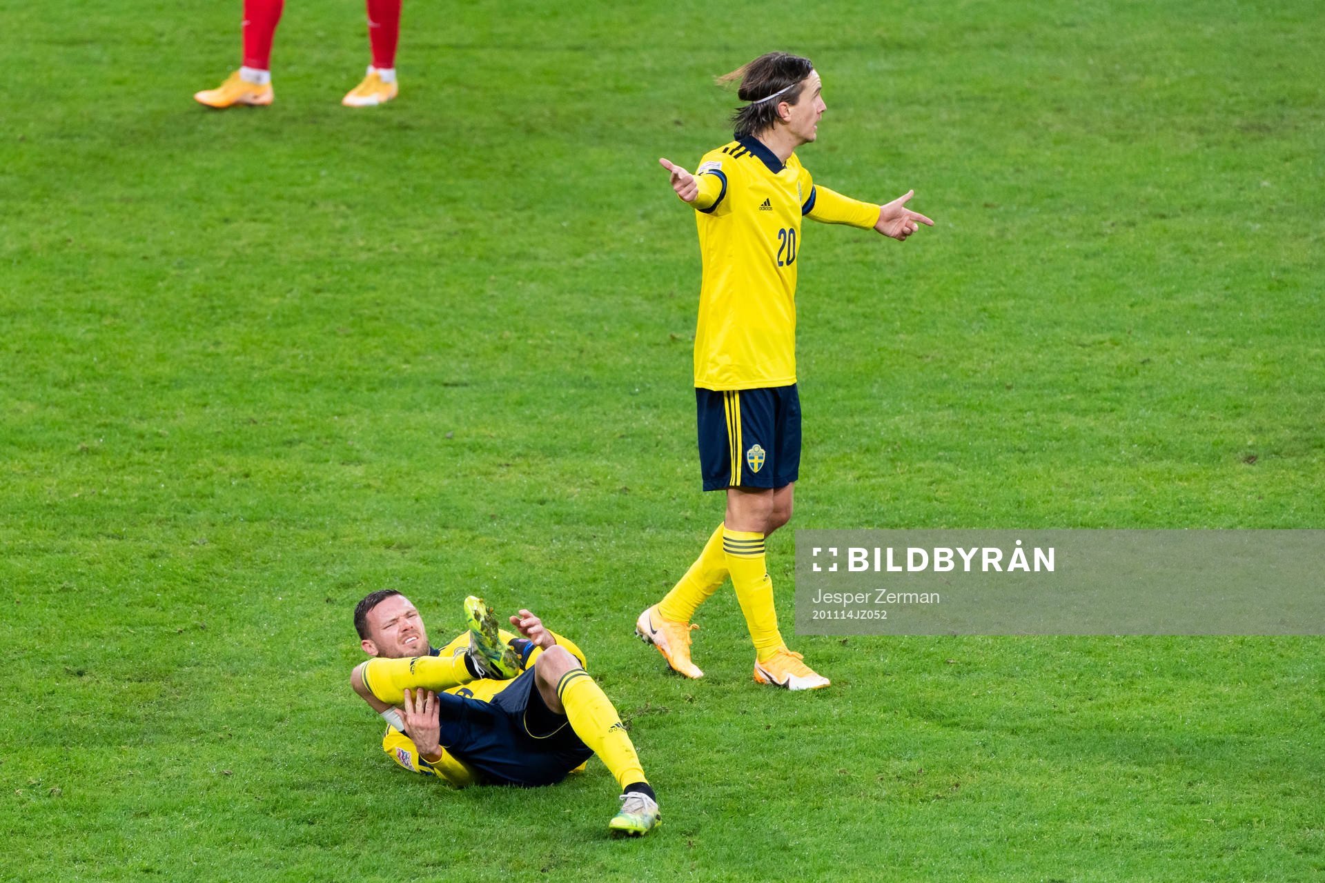 Marcus Berg and Kristoffer Olsson of Sweden reacts