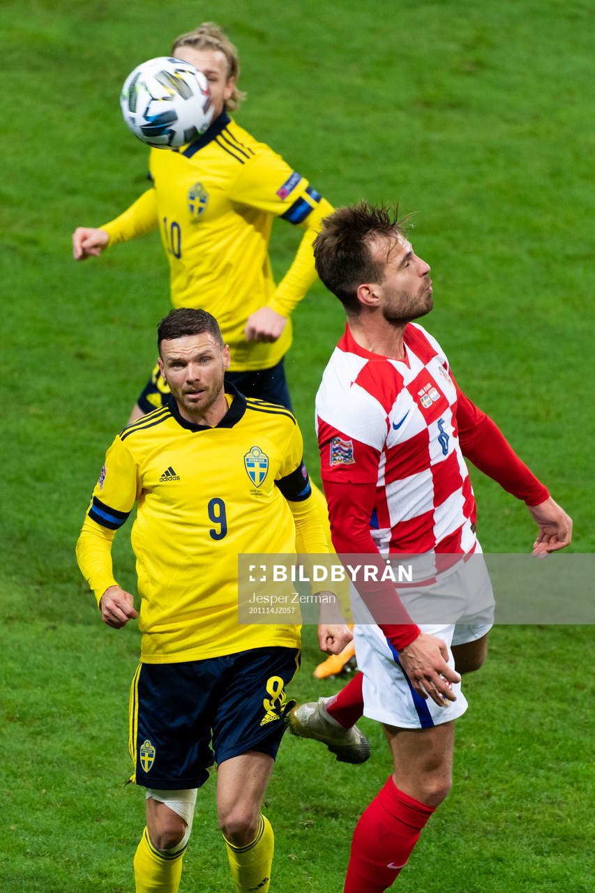 Marcus Berg of Sweden and Marin Pongracic of Croatia