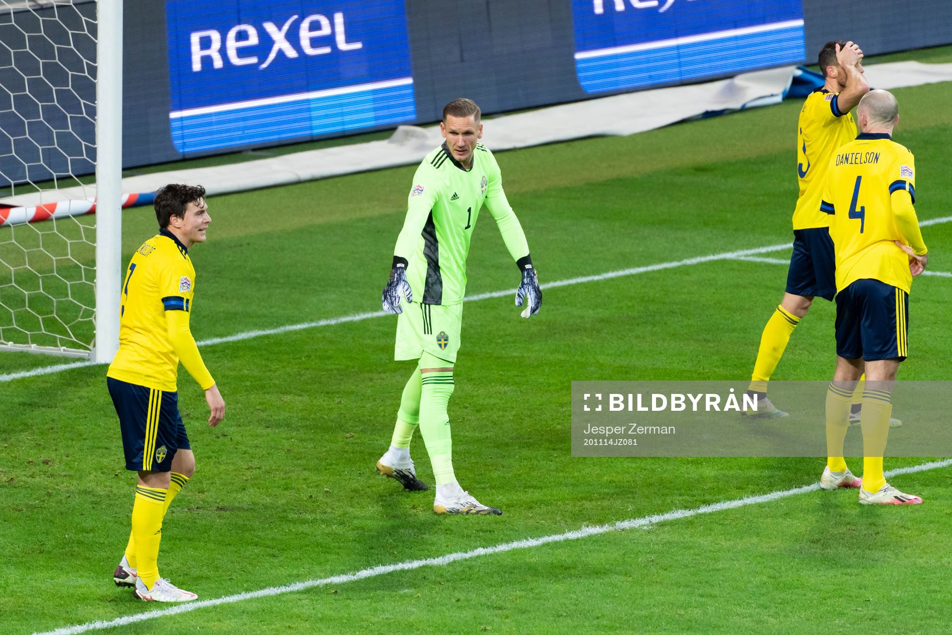 Victor Nilsson Lindelöf and goalkeeper Robin Olsen of