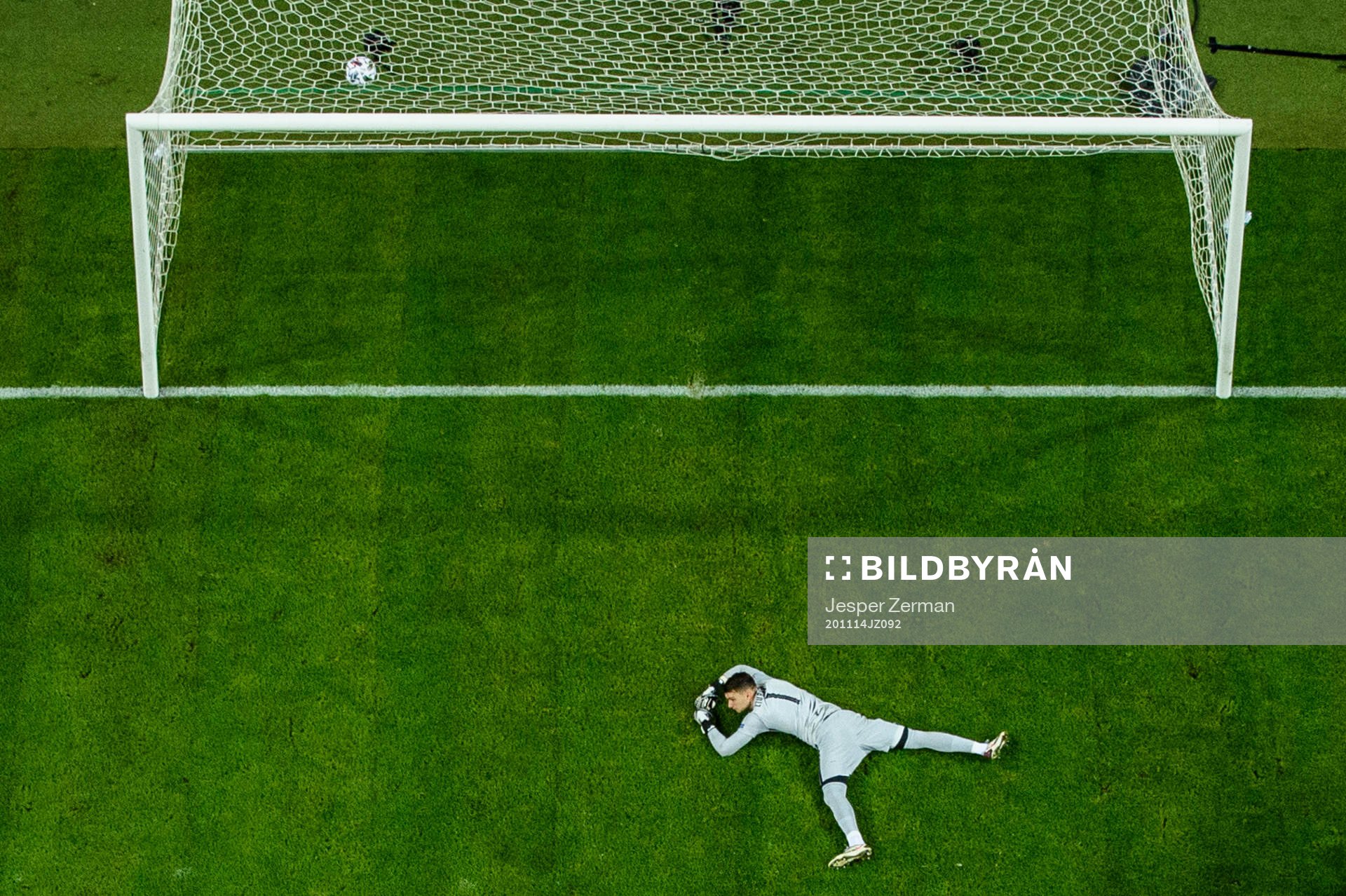 goalkeeper Dominik Livakovic of Croatia looks dejected
