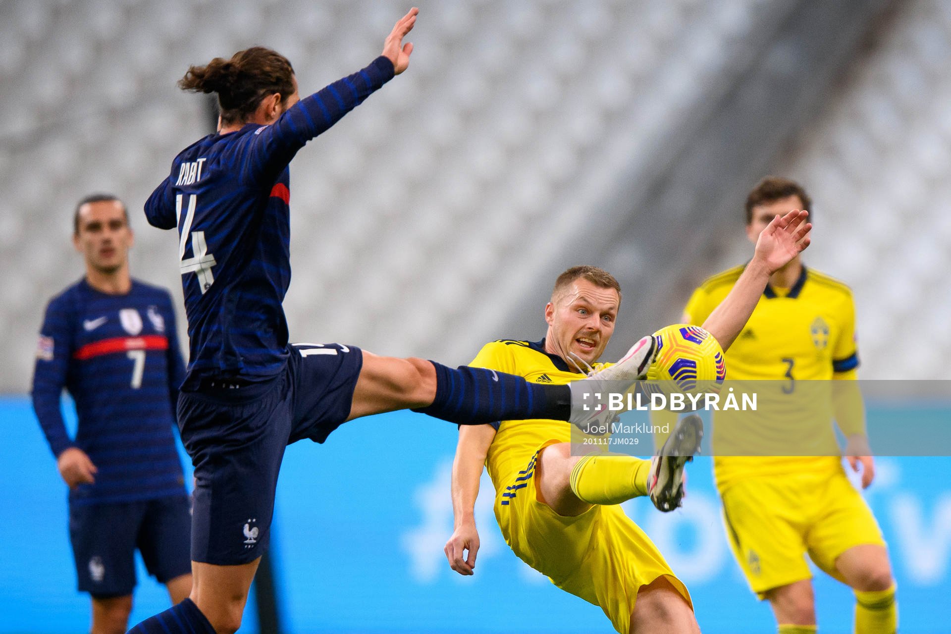 Adrien Rabiot of France and Sebastian Larsson of Sweden