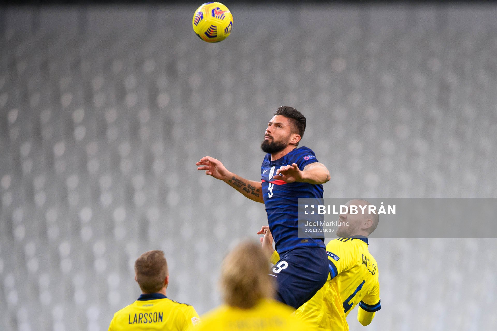Olivier Giroud of France and Marcus Danielson of Sweden