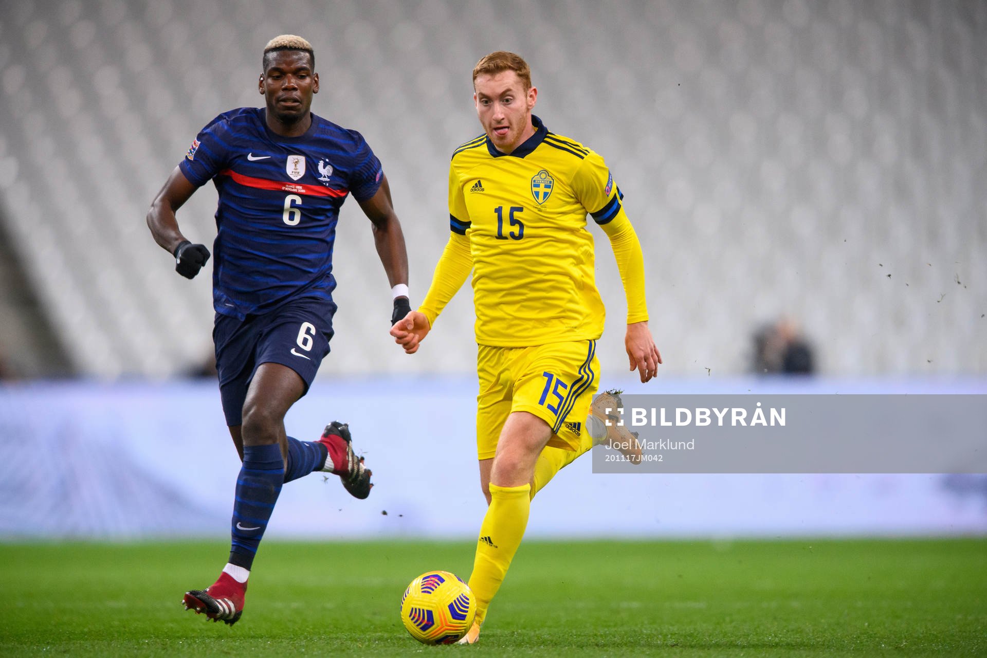 Paul Pogba of France and Dejan Kulusevski of Sweden