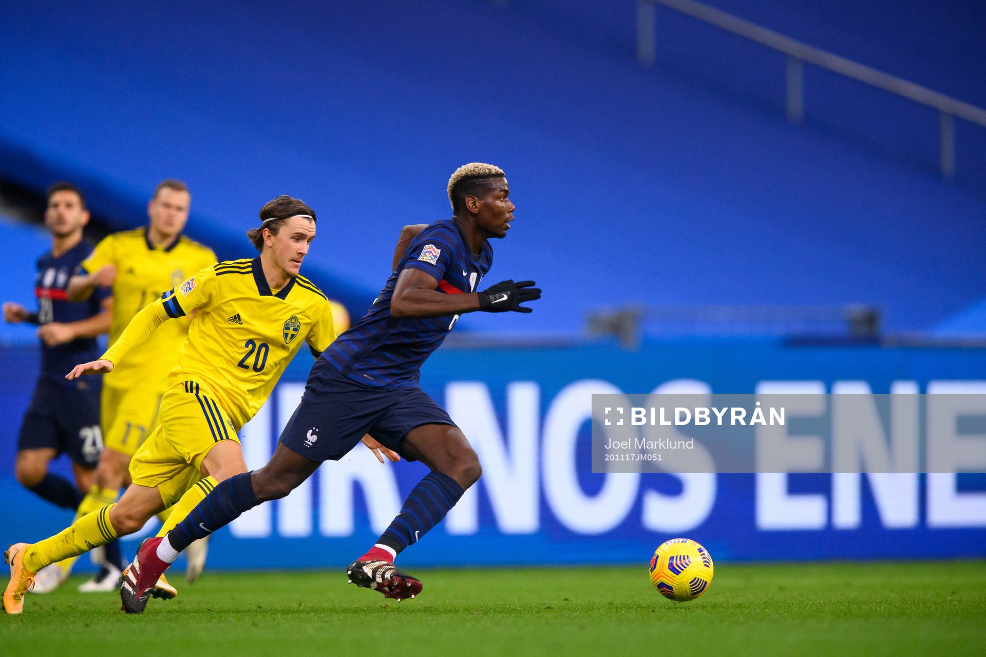 Kristoffer Olsson of Sweden and Paul Pogba of France