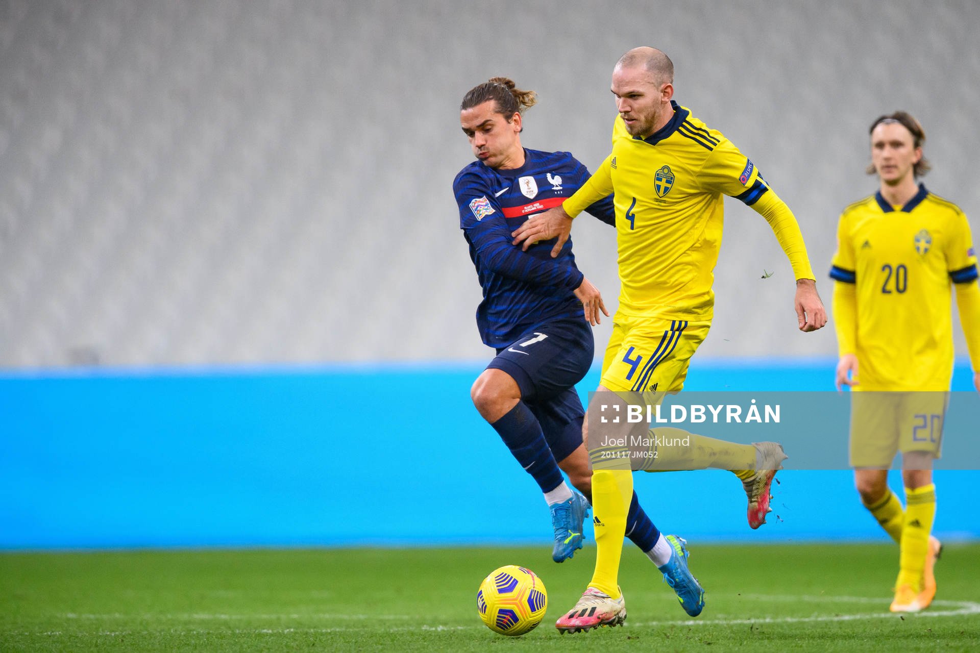 Antoine Griezmann of France and Marcus Danielson of Sweden
