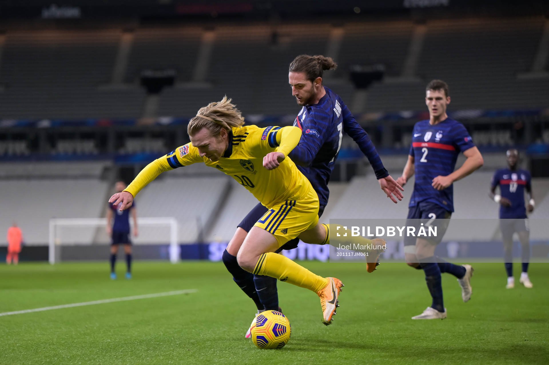 Emil Forsberg of Sweden and Adrien Rabiot of France