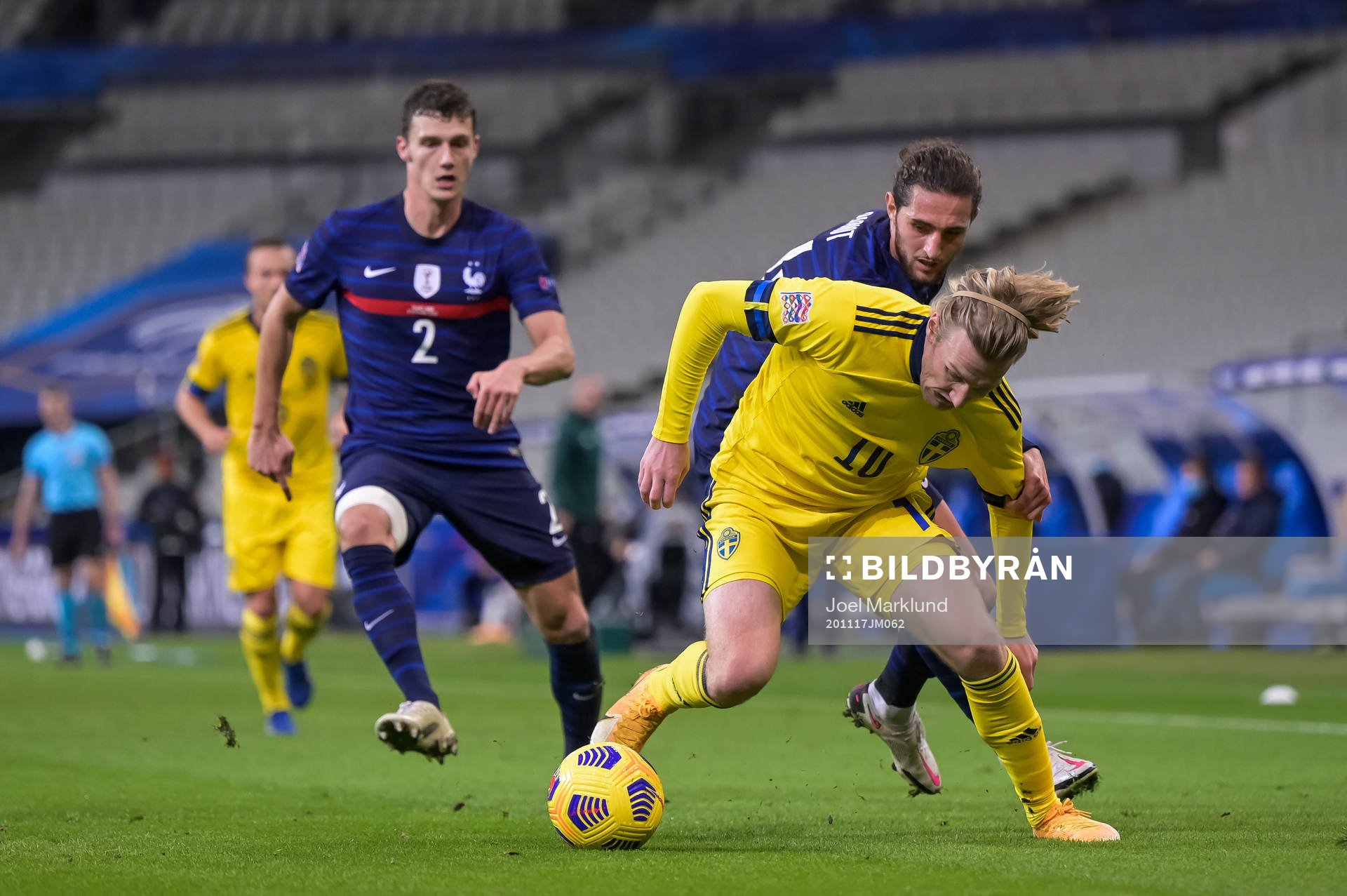 Benjamin Pavard and Adrien Rabiot of France against Emil